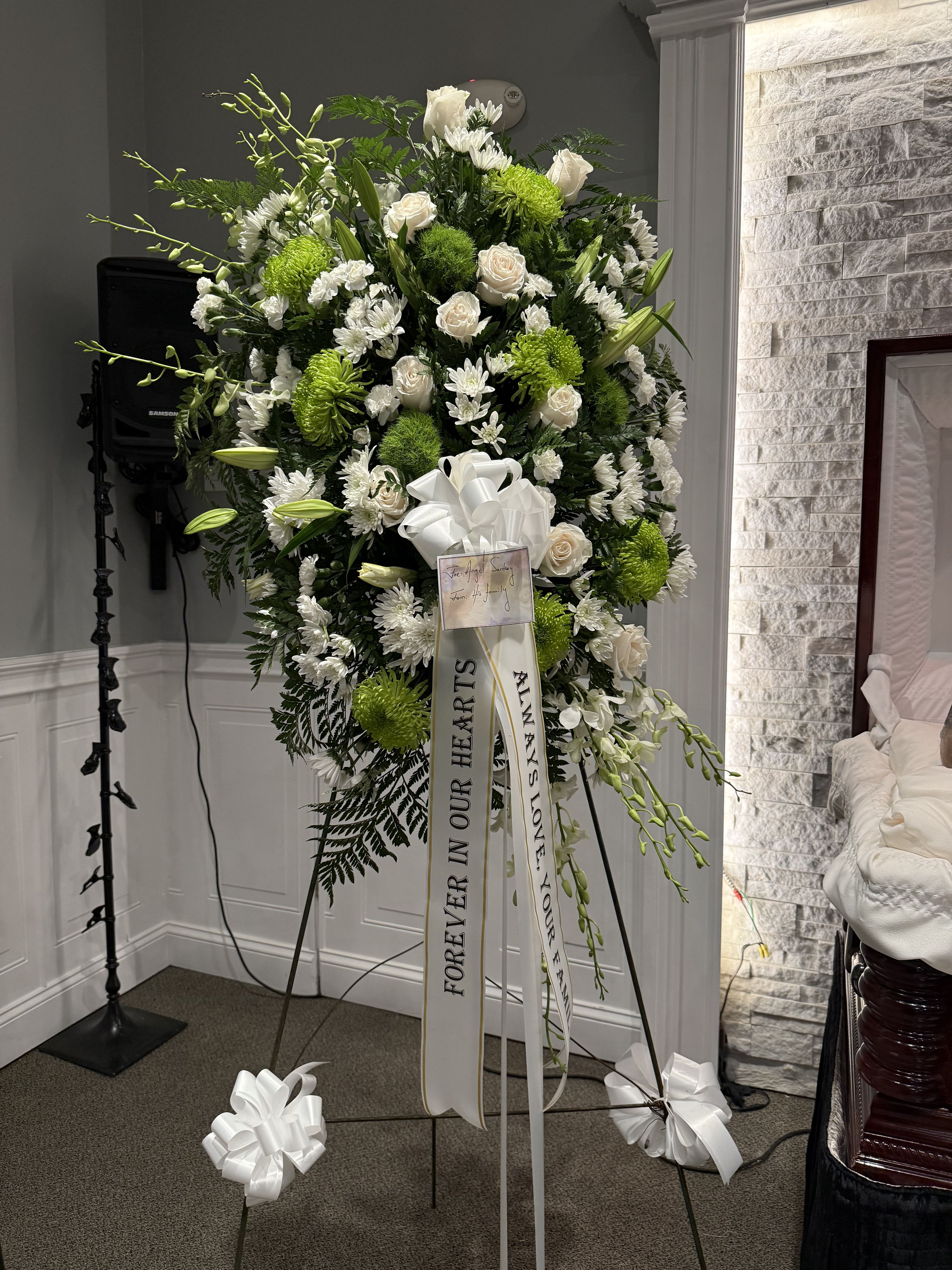 Hope and Peace  - This standing spray is a profoundly comforting and uplifting funeral arrangement, designed to convey solace, serenity, and the enduring spirit of hope.