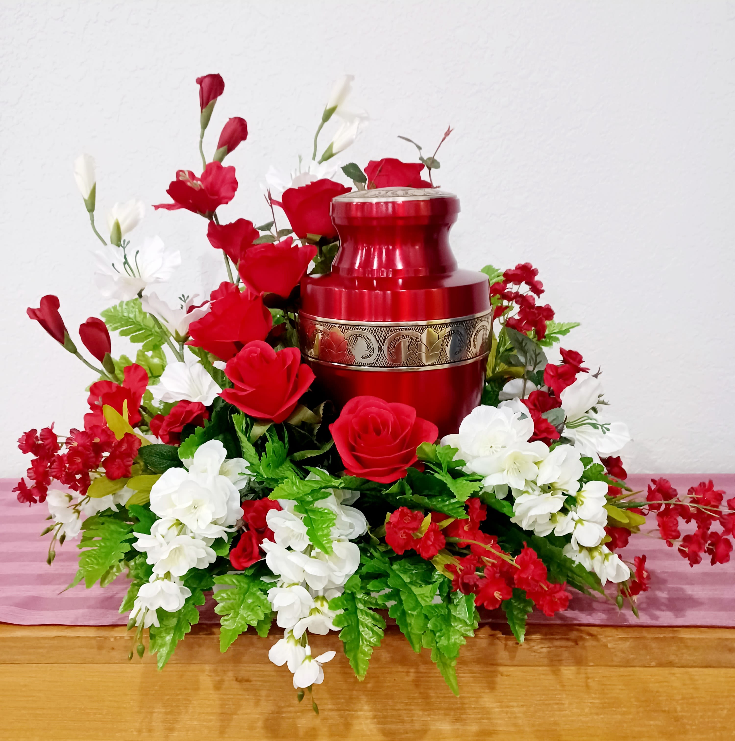 Love Endures Cremation Tribute - This is a beautiful silk tribute spray that can be made in fresh flowers also. This one has roses, gladiolus, and stock. This would be perfect for your loved ones memorial! Can be made in any colors.