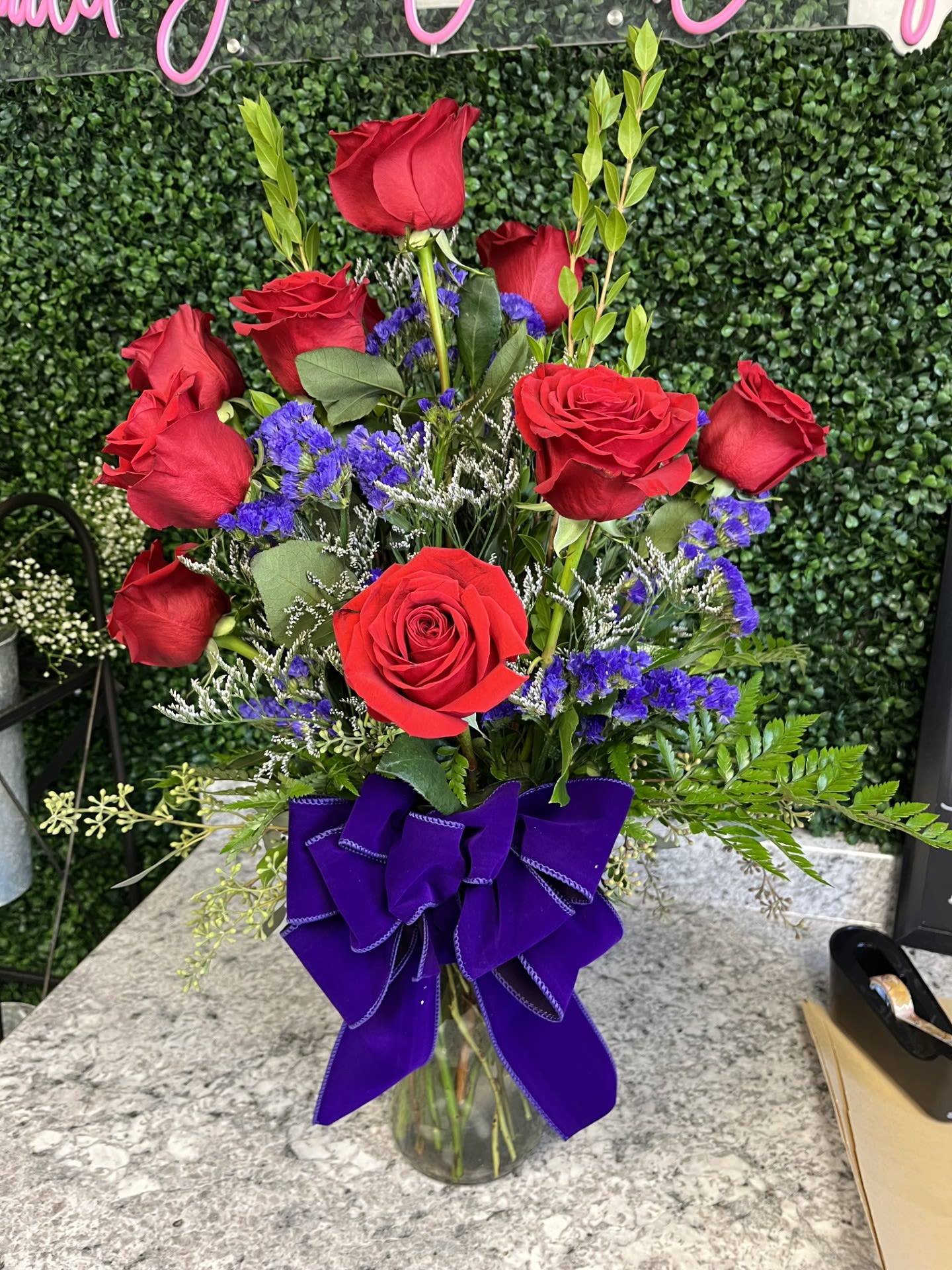 #10 Valentine arrangement  - Clear or Red vase w/ a dozen red roses and filler! Can change color of bow and filler! 