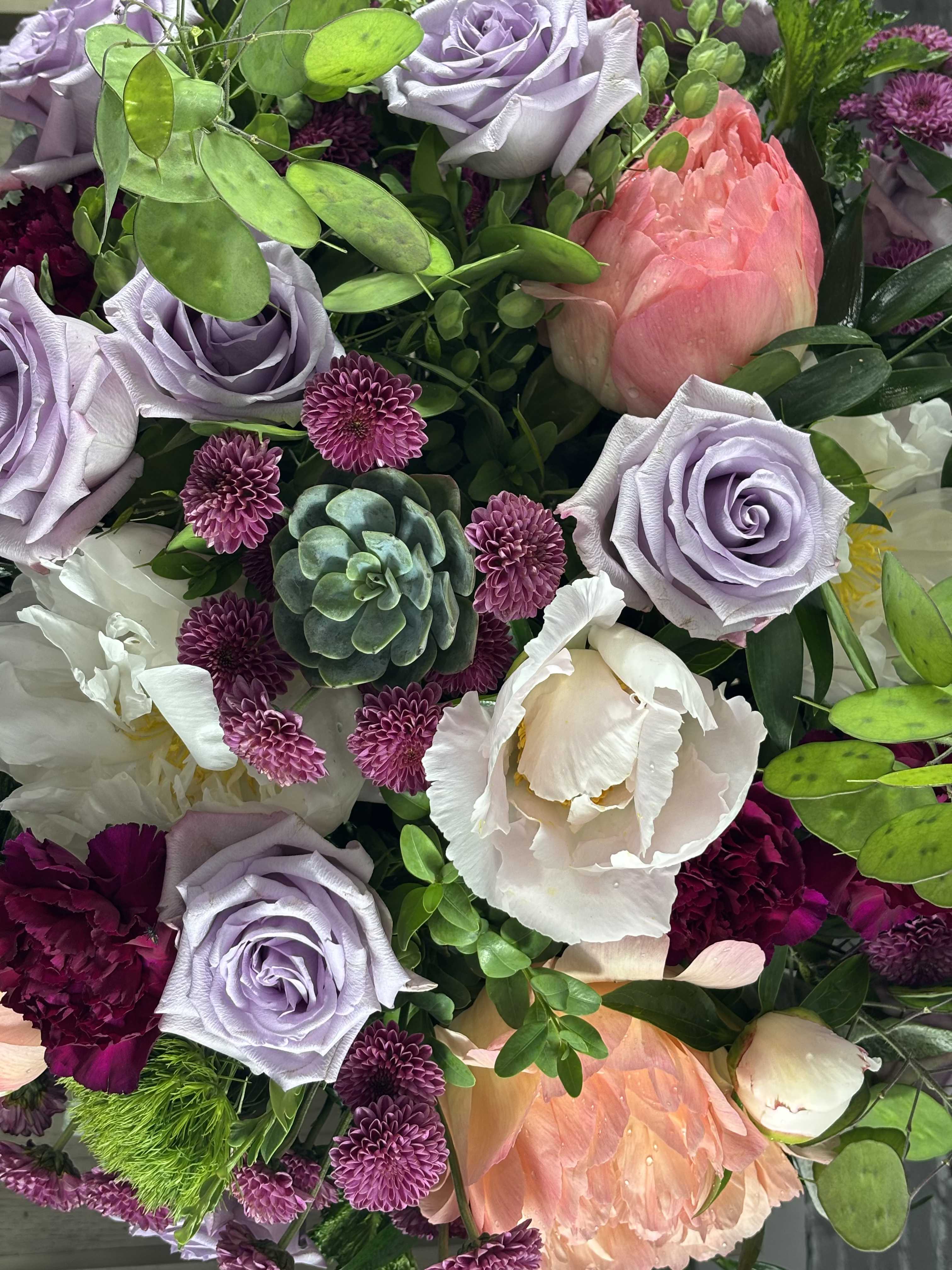 Designer's Choice Designer's Choice - Let our floral designer create a hand crafted seasonal bouquet incorporating some of our garden fresh flowers. Each arrangement is exclusively picked based on your budget. Relax and leave all the hard work up to us!