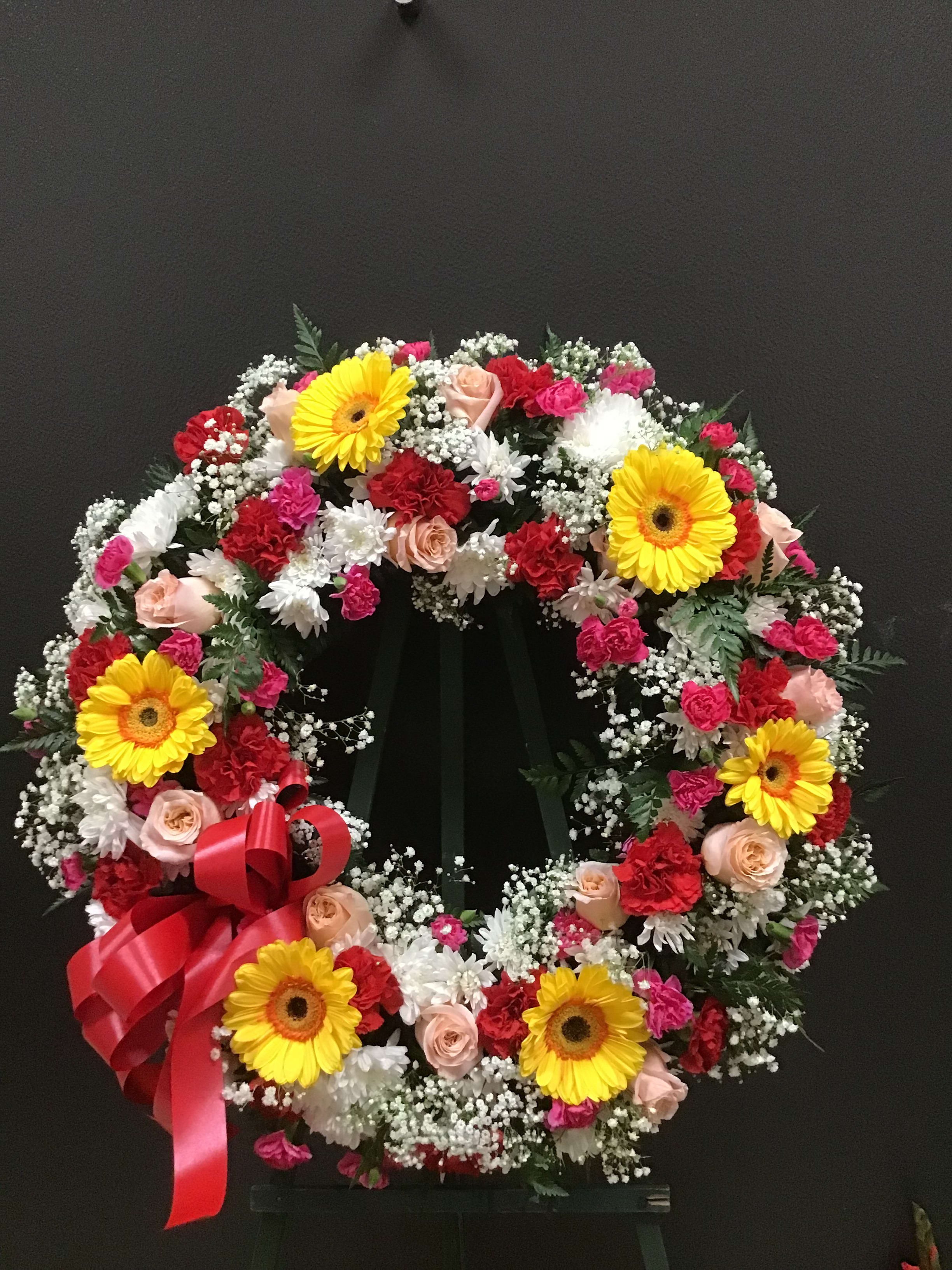 Bright color standing wreath (FW31) Bright color standing wreath (FW31) - This wreath made with bright color flowers