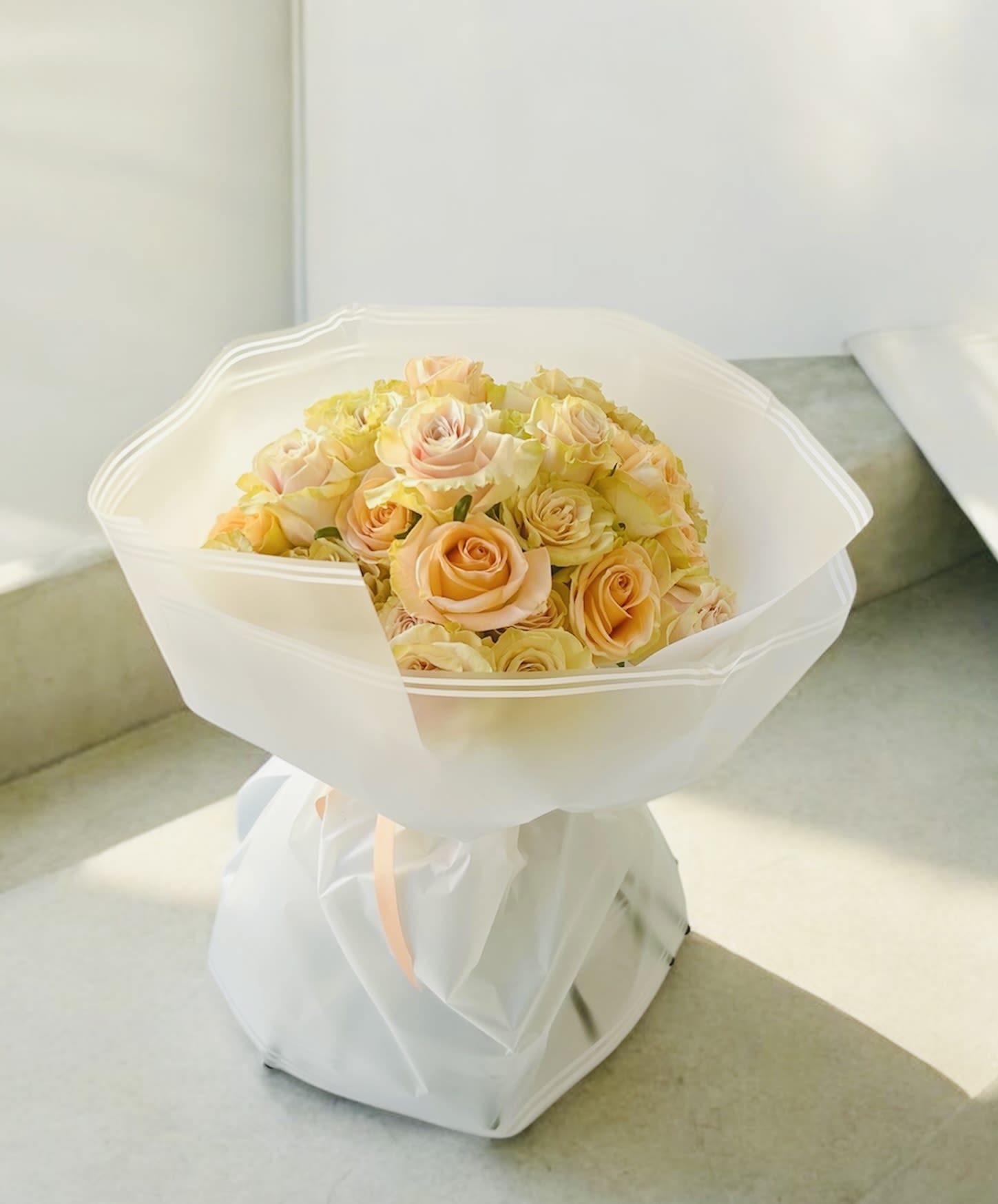 Agape’s Signature Bouquet - For Bouquets, we DO NOT include vases unless you add one.  For Vased Flowers, we include vases.   Description:  The arrangement comes in three sizes.  [Standard- 2 dozen:: Deluxe- 3 dozen::].  It is a mix of light pink and peach roses. The same day delivery is not offered if you request different color of roses. To request different color, let us know a week in advance by contacting us. One in the picture is [2 dozen].   Right now, you can expect spring blooms sourced from local farms.   We use small ordinary 4in by 3in cards. If you want to send flowers with a special messaging card, please choose one from add-ons!  Delivery: our standard delivery time window is between 3:00pm and 5:00pm.   If you have any questions regarding the order, please feel free to contact us!   Email: agapeflower.studio25@gmail.com  