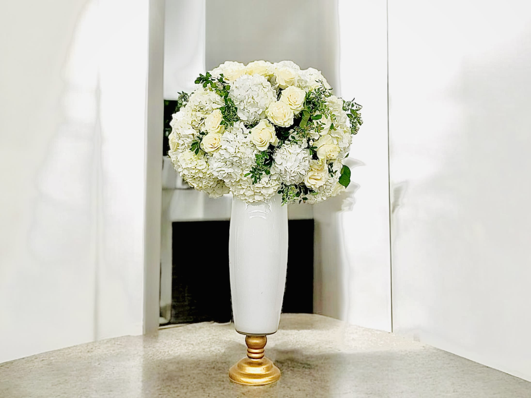 Tall BALL Piece  - Please keep in mind that the arrangement does not include a tall vase. Also, leave an email in advance to place the order.    This arrangement could be placed in hotel lobbies or corporate. It could be a tall statement piece for your wedding tables as well.   We can replace the tall vase with stands.   The flower statement piece is $380 and with the vase is $100.  Without the vase is possible as well. Please reach out to us if that is the case.  Rental is available but we charge $50 if it is not returned properly - broken or damaged. 