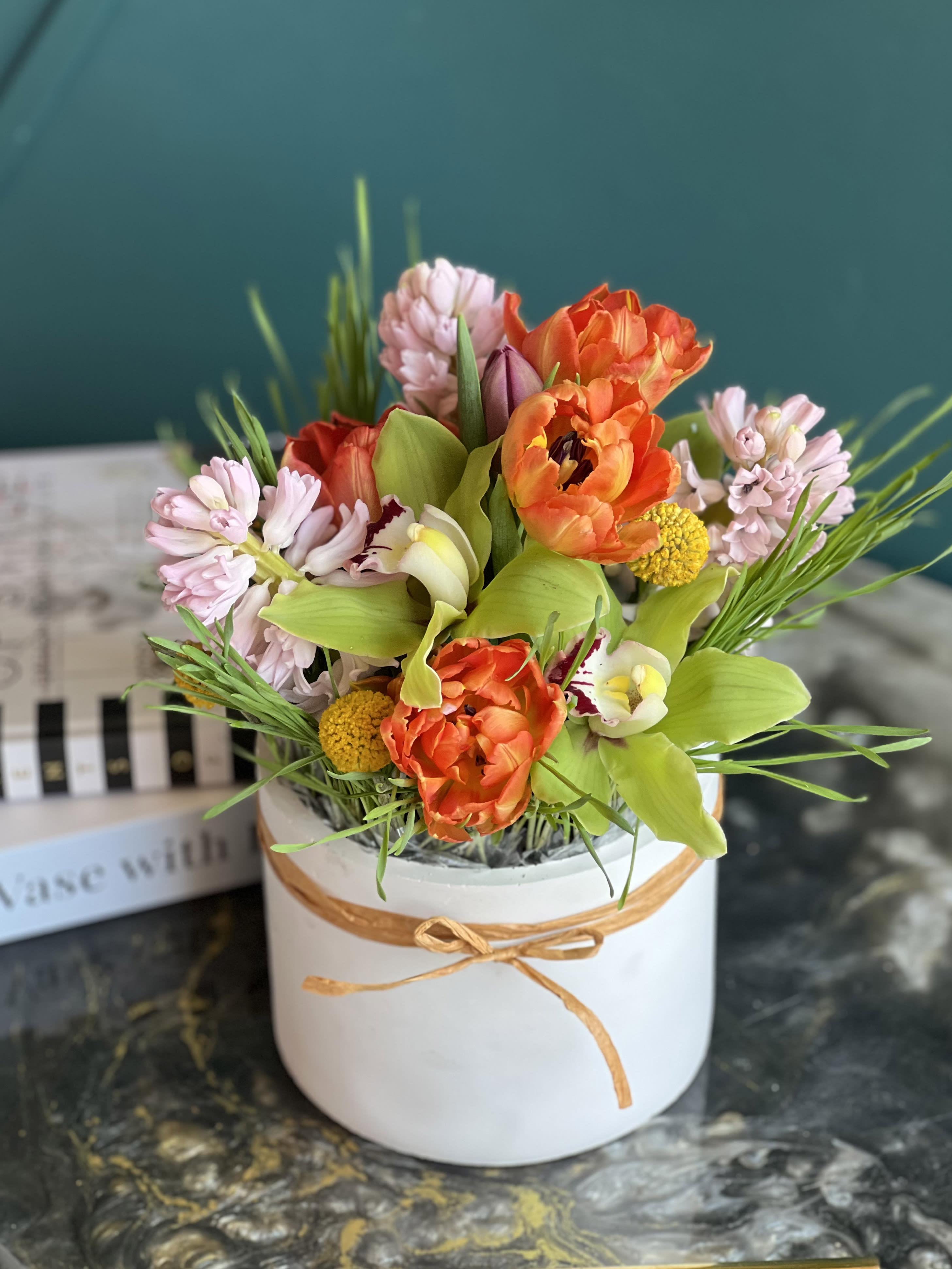 Bright Spring Mix - Bright, fresh flower arrangement in cement pot with mixed spring flowers
