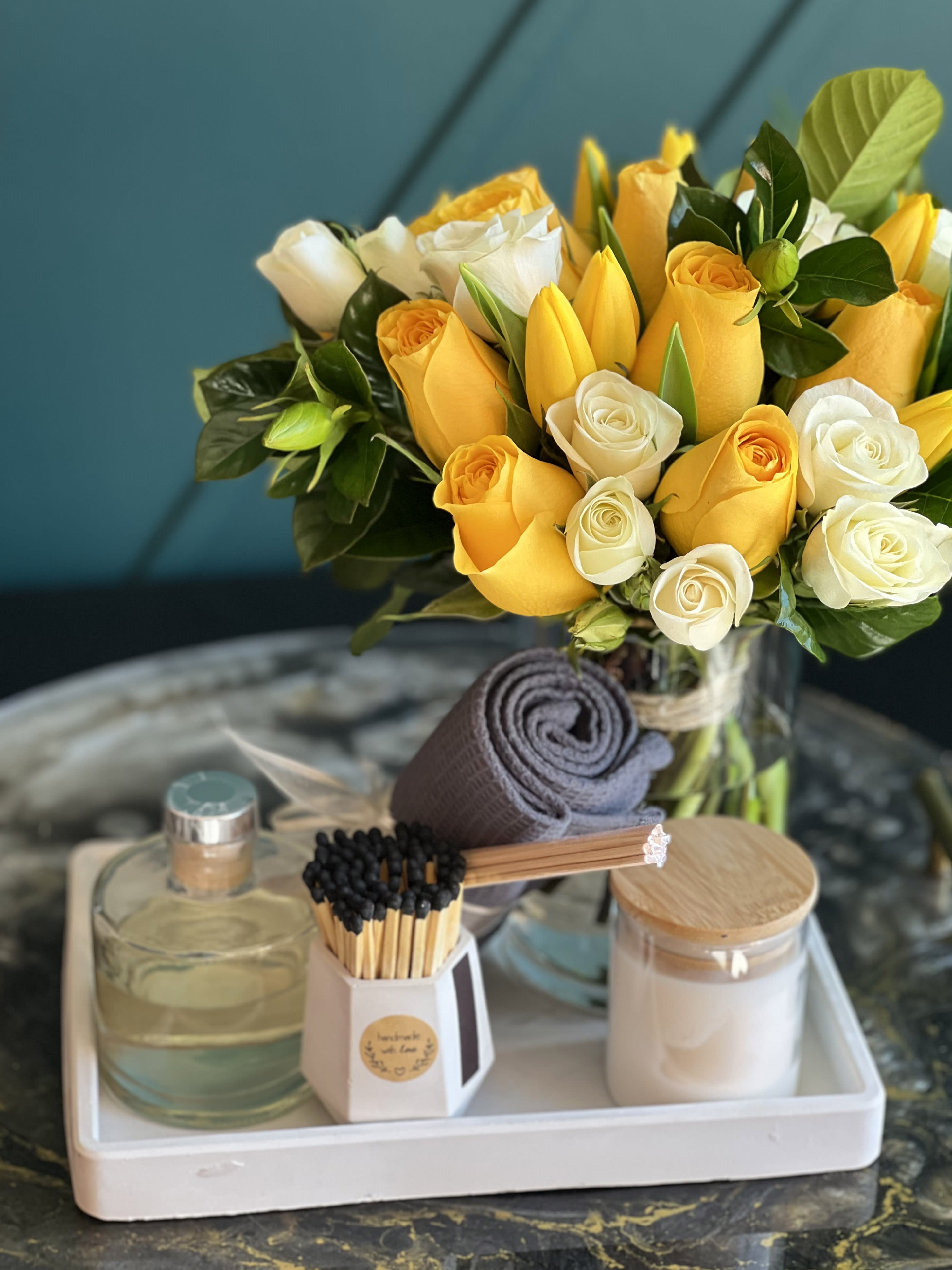 Bright set  - Gift set with fresh cut flowers in a vase ( roses, spray roses, tulips), candle, fragrance diffuser, small towel and matches.  Arranged on custom made cement tray