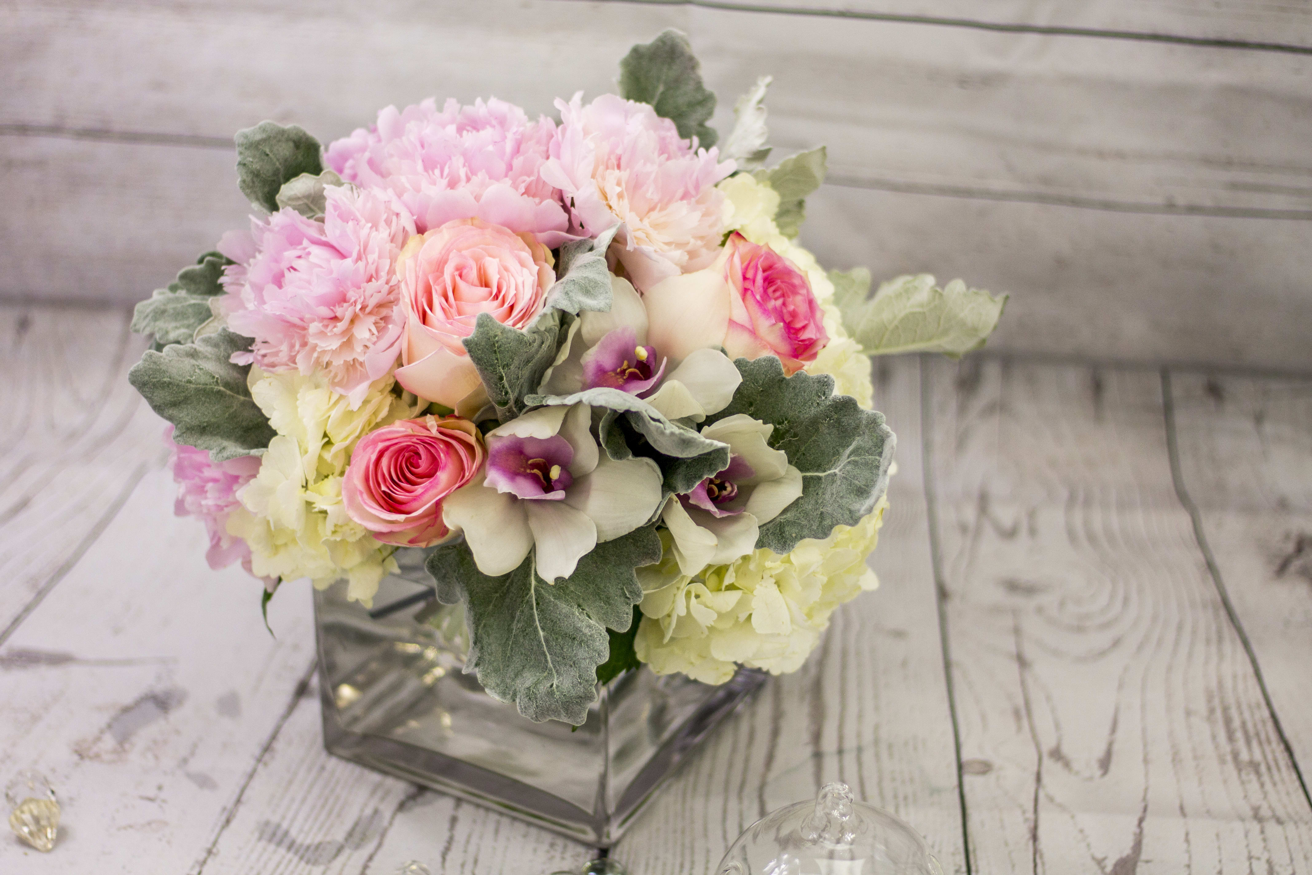 Spring Flower Delight  - Elegant Flower Arrangement in cube clear vase will be great flower present for any person or occasion. Soft combination of light pink peonies, pink roses, orchids and hydrangeas. 
