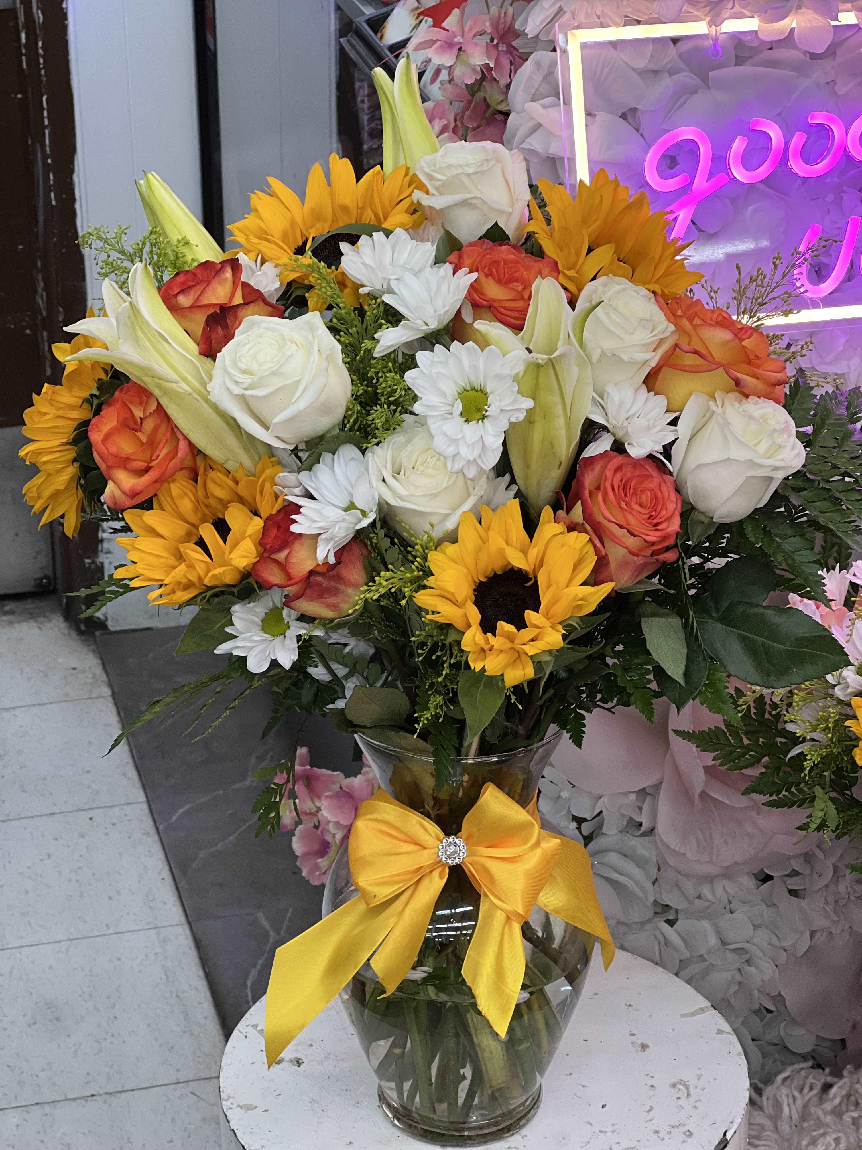 Goodness and Light Arrangement - This arrangement you can order it for get well soon , or just because! Even for birthdays the colors are beautiful and bright ! Nothing says &quot;Get Well Soon&quot; like a vibrant bouquet of fresh flowers! Look no further for get well gifts than Brenda's Beauty Flowers. We deliver get well flowers to Los Angeles, CA to brighten their day. They'll be sure to get well soon!  Occasionally, substitutions may be necessary to create your bouquet due to the availability of certain flowers in various parts of the country. Care is taken to maintain the style, theme and color scheme of the arrangement, using flowers of equal value. Additionally, the substitution of certain keepsake items may be necessary due to increased demand, especially during major holidays. In single-flower arrangements, such as an all rose bouquet, or orchids, we will make every attempt to match the flower type, but may substitute with another color.