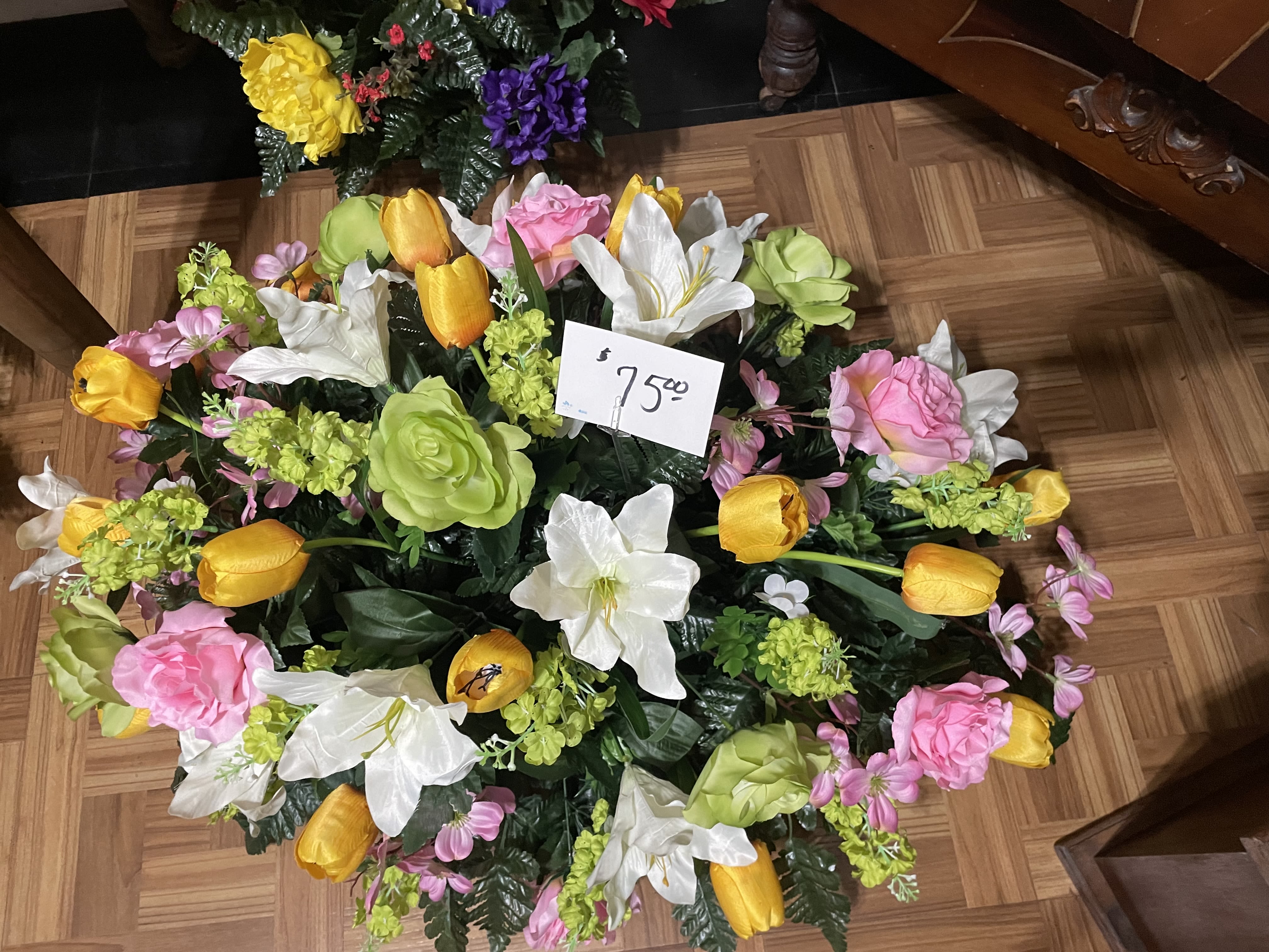 Sunny cemetery Saddle Sunny cemetery Saddle - Cemetery saddle in color scheme of summertime . Medium size. Silk flowers. Exact flowers may vary depending on stock. Please call with questions, or note in special instructions. This can be put on a stand for funeral services. We do deliver to local cemeteries, please provide detailed delivery instructions