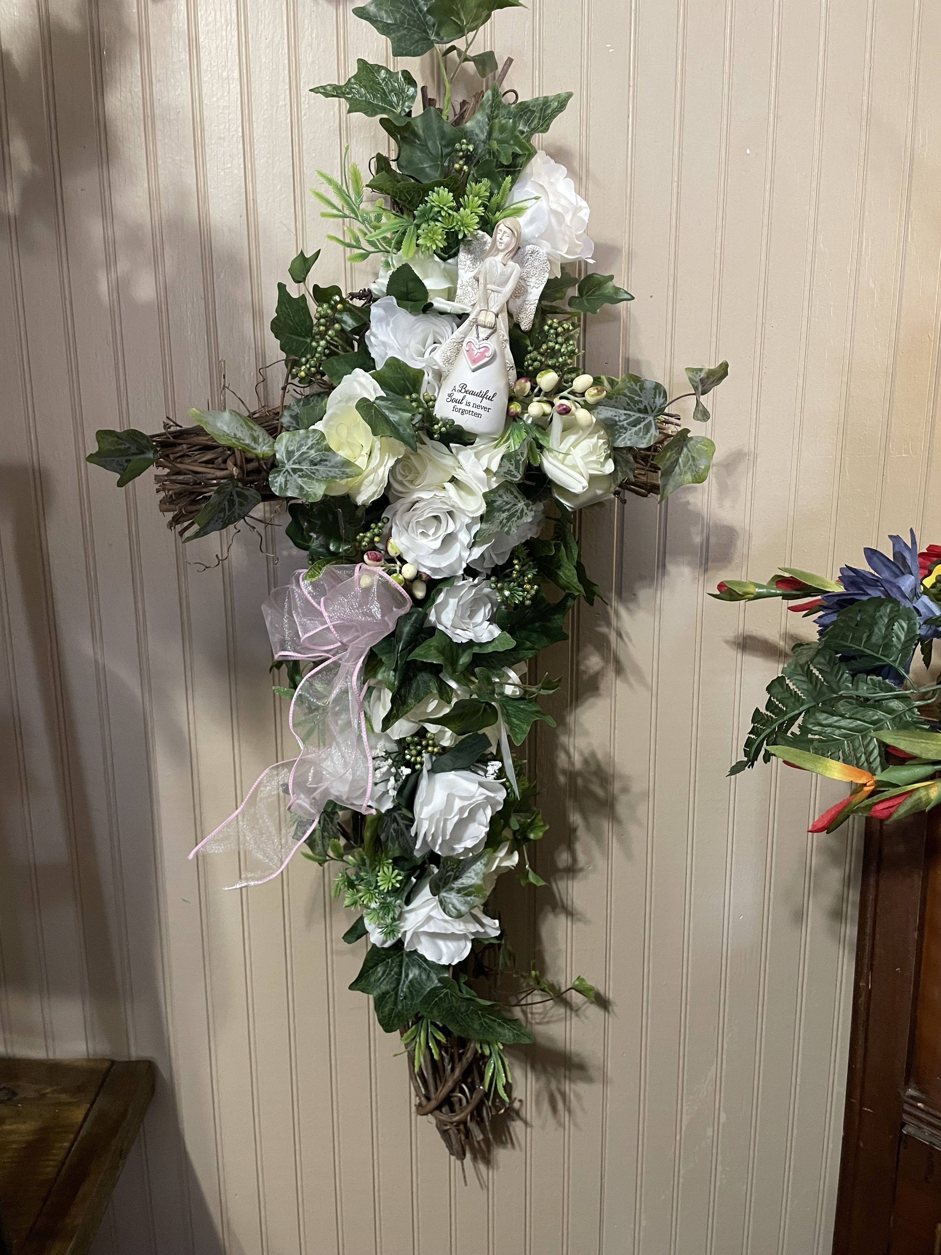 Beautiful Soul Silk Grapevine Cross Beautiful Soul Silk Grapevine Cross - Handmade grapevine cross designed in beautiful shades of white with a ceramic angel.