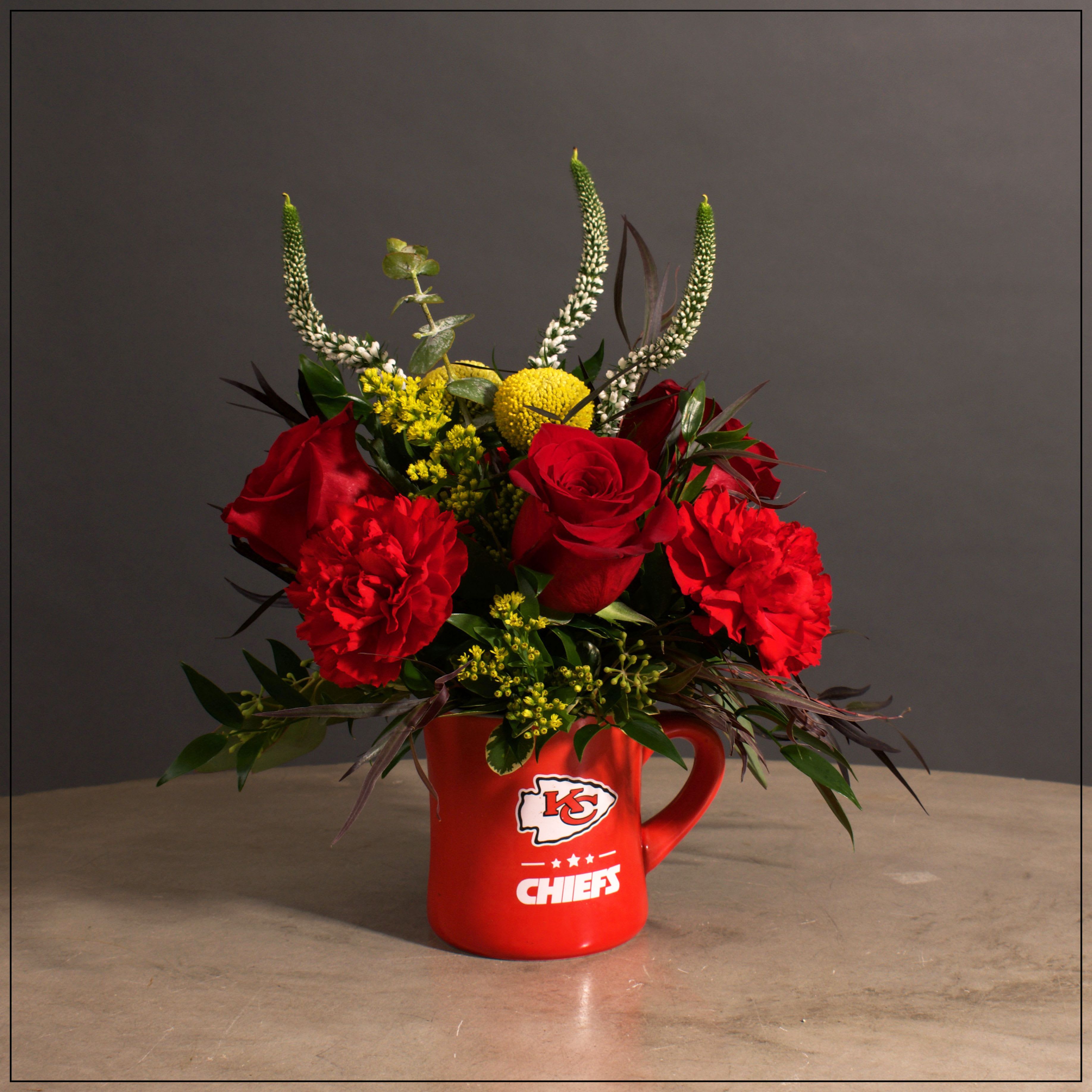 Go Chiefs! - Keepsake Chiefs mug, for the fan in your life, filled with roses, carnations, Billy balls, veronica, and solidago. Approximately 12&quot;x12&quot; 
