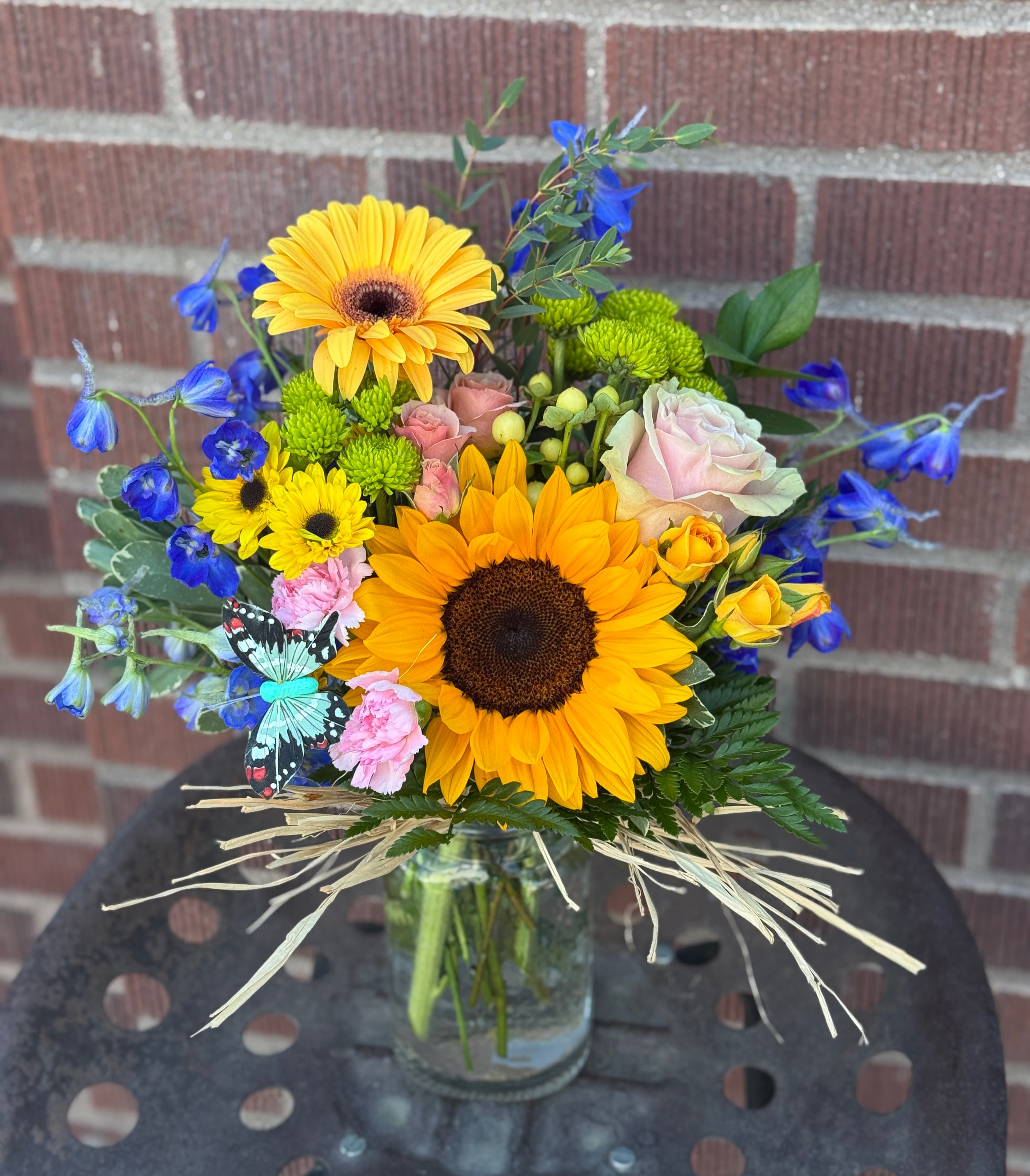 Mason Jar Memories - We really don't know what to name these things... so there ya go! Another designed by our own girls here at the shop. For those who love mason jars, raffia and sunflowers. :)  (We only have a photo of a standard and premium up on our site right now, photos of deluxe to come soon.)