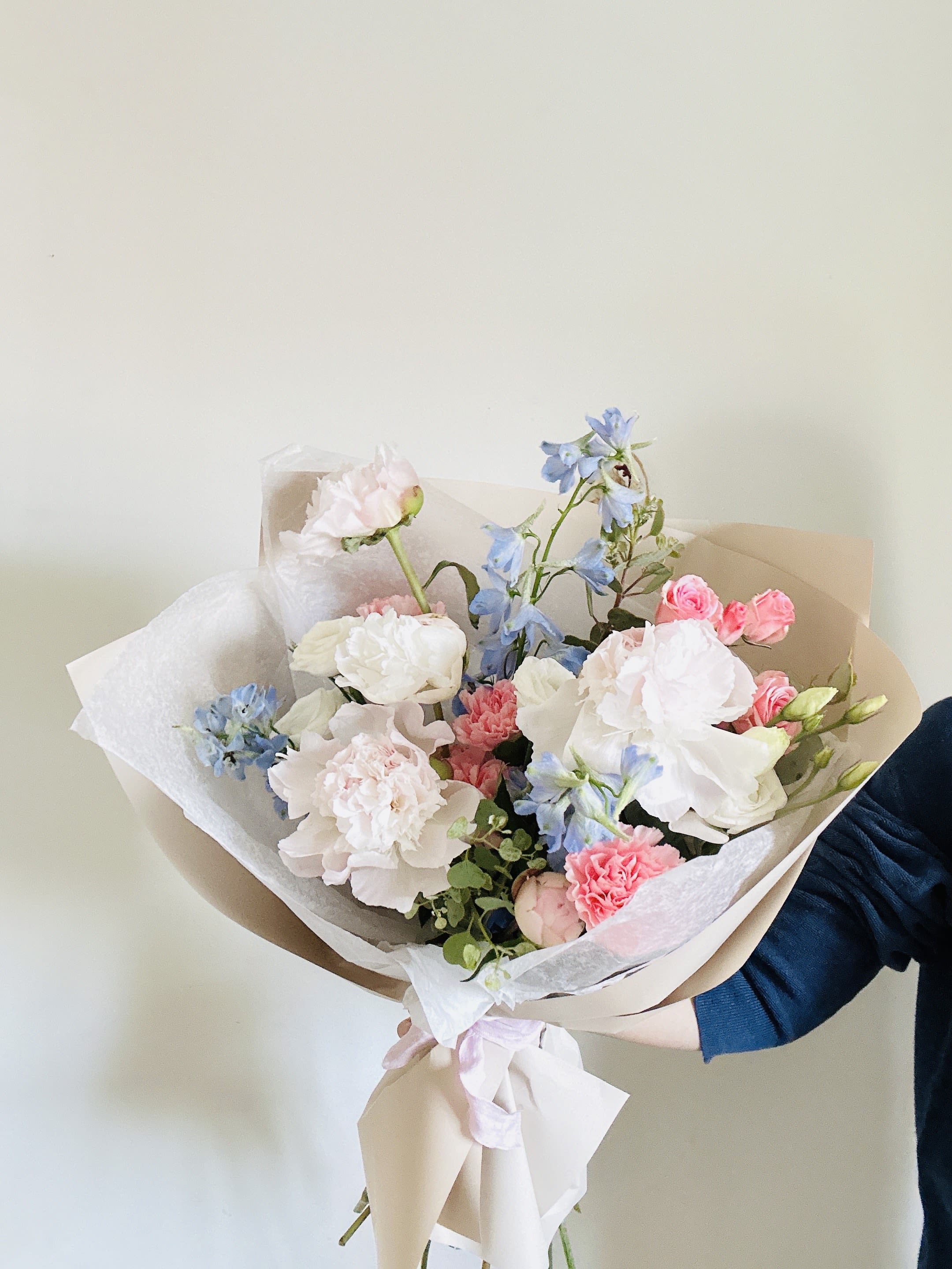 Thank you - Right now, we can replace peonies with garden roses.   Please keep in kind that no arrangement can be made identical to the photos shown (as some flowers are seasonal). Therefore, we will substitute them accordingly with in-season flowers instead. We will do our absolute best to arrange the flowers as similar as possible with the photos shown!   For Bouquets, we DO NOT include vases unless you add one.  For Vased Flowers, we include vases.   Right now, you can expect summer blooms sourced from local farms.   We use small ordinary 4in by 3in cards. If you want to send flowers with a special messaging card, please choose one from add-ons!  Delivery: our standard delivery time window is between 3:00pm and 5:00pm.   If you have any questions regarding the order, please feel free to contact us!   Email: agapeflower.studio25@gmail.com  