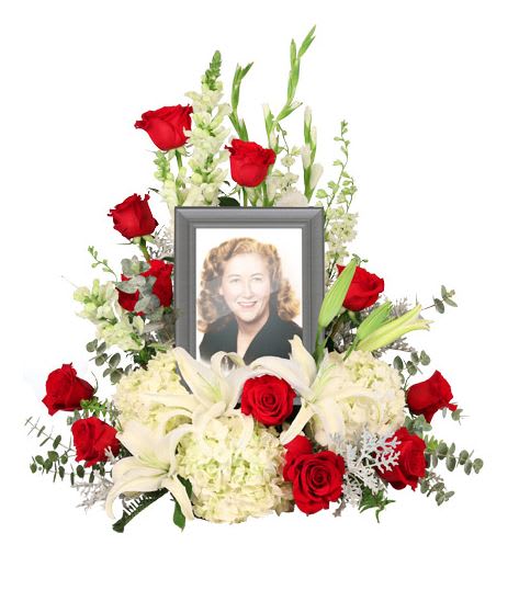 Missing You - Picture Frame Accent Missing You - Picture Frame Accent - Honor and celebrate the fruitful life of a lost loved one with an arrangement that truly encompasses their elegance. The Missing You memorial arrangement is a luxurious addition to any memorial service. Encompassing the picture of your choice, this arrangement features majestic white hydrangeas that will ease the minds and comfort the souls that are grieving with contrasting red roses to represent the vibrance of their life. Design is compatible with picture frames sizes approximating 12" H x 8" W. Picture Frame not included.