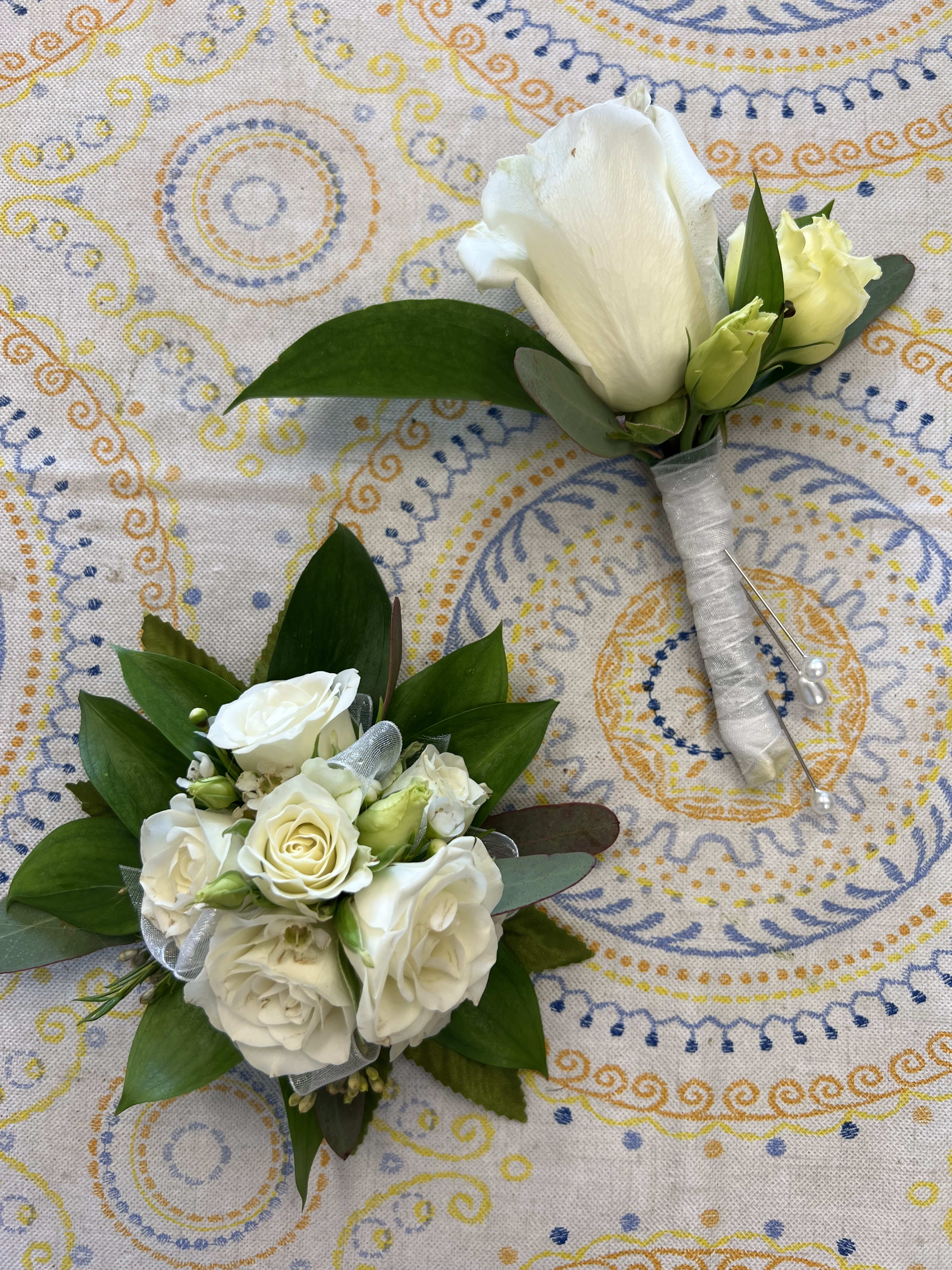 Spray Rose Corsage and Boutonniere Set - Weddings or Prom night calls for beautiful corsages, boutonnieres, and prom flower bouquets to make every prom-goer look their best! From spray roses corsages to rose boutonnieres, order your favorite flower &amp; color to wear this special day.  Once you place your order, we will contact you with regards to ribbon color and accessories color.