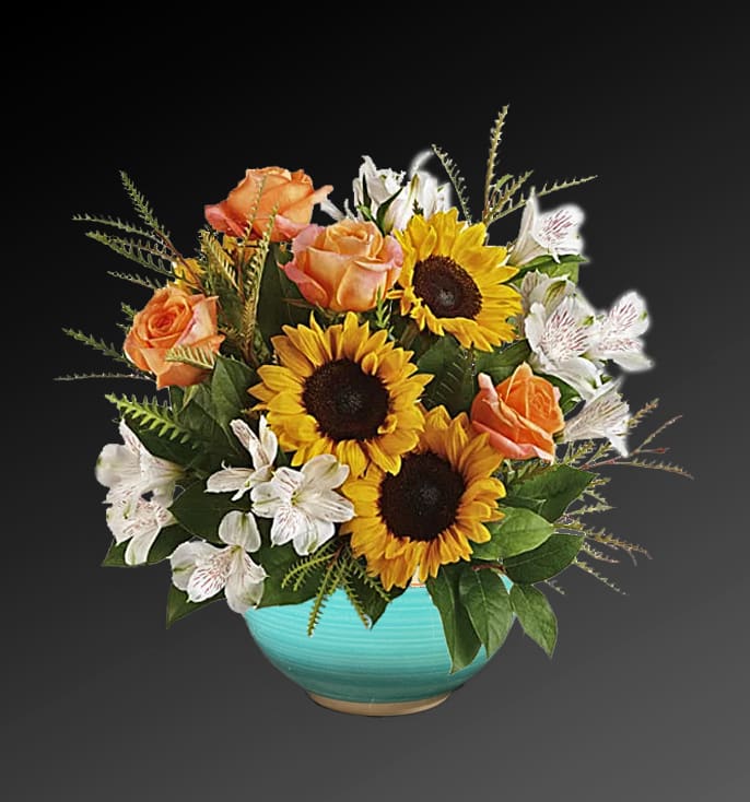 Sun Day Bouquet - Send a sweet ray of sunshine someone's way with this cheerful yellow bouquet, artfully arranged in a vintage-inspired glass cube.