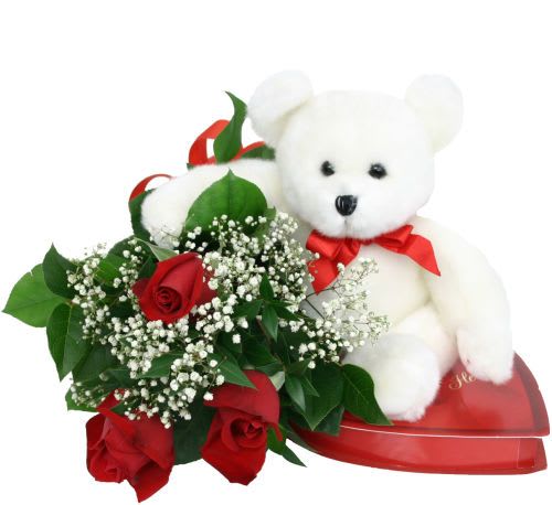 Be My Valentine Be My Valentine - Make a statement with this perfect combination of three red roses with baby's breath, plus a plush teddy bear and a delicious heart-shaped box of chocolates. Go ahead... be romantic.