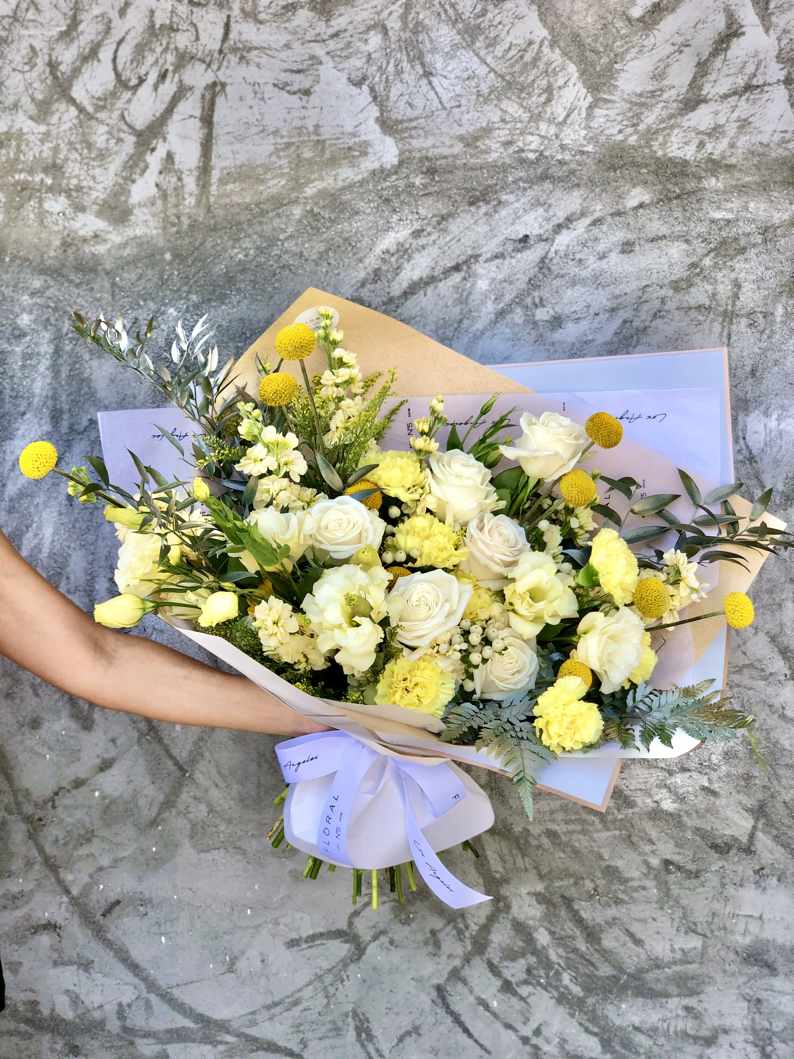 NO .116 - YELLOW MIX NO .116 - YELLOW MIX - This mixed flower bouquet is a heartfelt expression of life’s most meaningful moments—crafted with care by our dedicated florist in Studio City. Each stem is thoughtfully selected to create a vibrant blend of color, fragrance, and feeling. More than just flowers, it's a gesture that speaks volumes. With same day flower delivery, your sentiment arrives right on time, beautifully delivered and impossible to forget.Stunning bouquet of mixed yellow flowers, hand tied with our signature white ribbon. Elegant and tender bouquet - perfect gift for any occasions. Available in three size options. On the photo: Size - Deluxe.