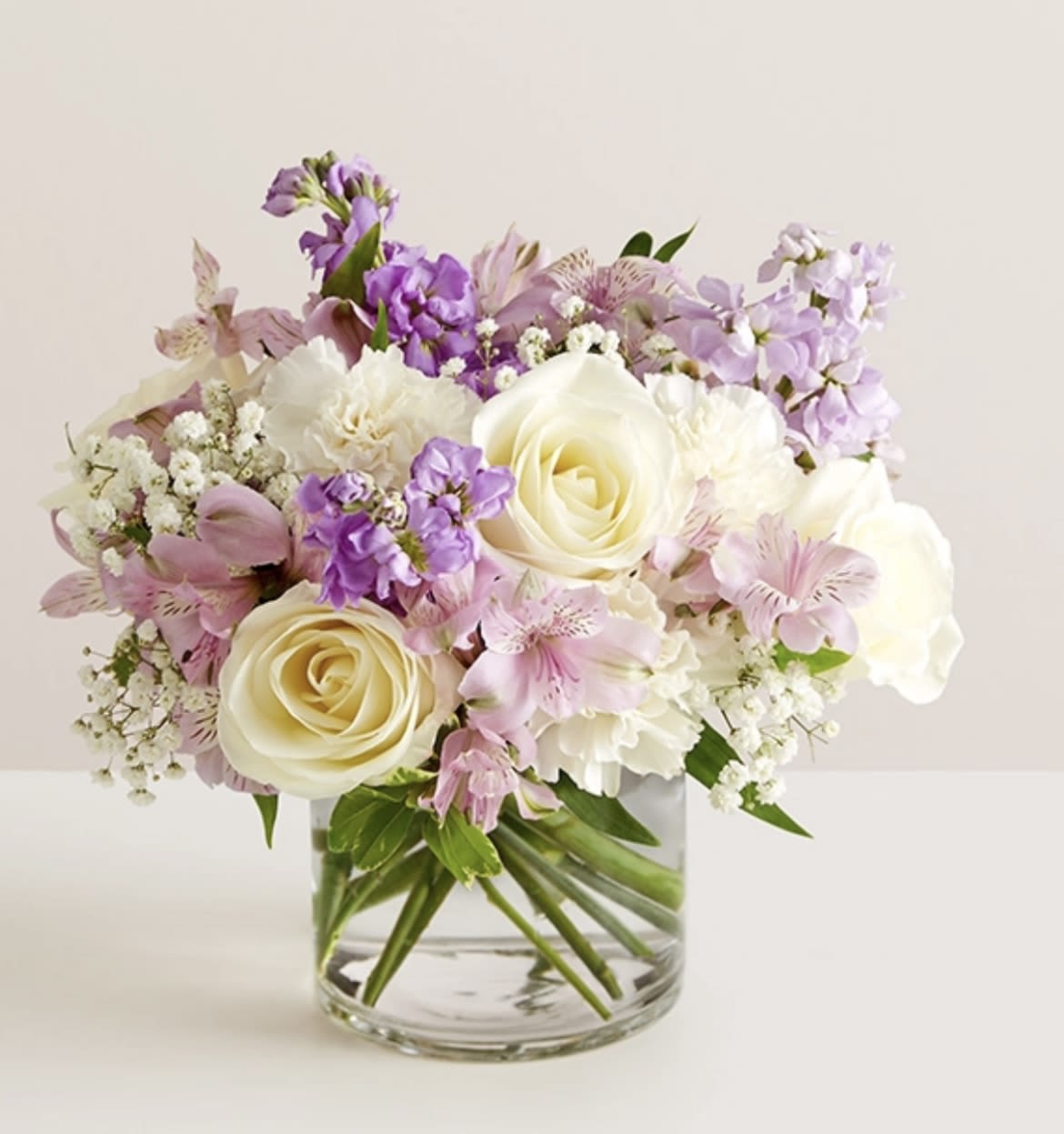 the sweetest thing  - pinks , lavenders , whites , creams in a glass cylinder or cube 