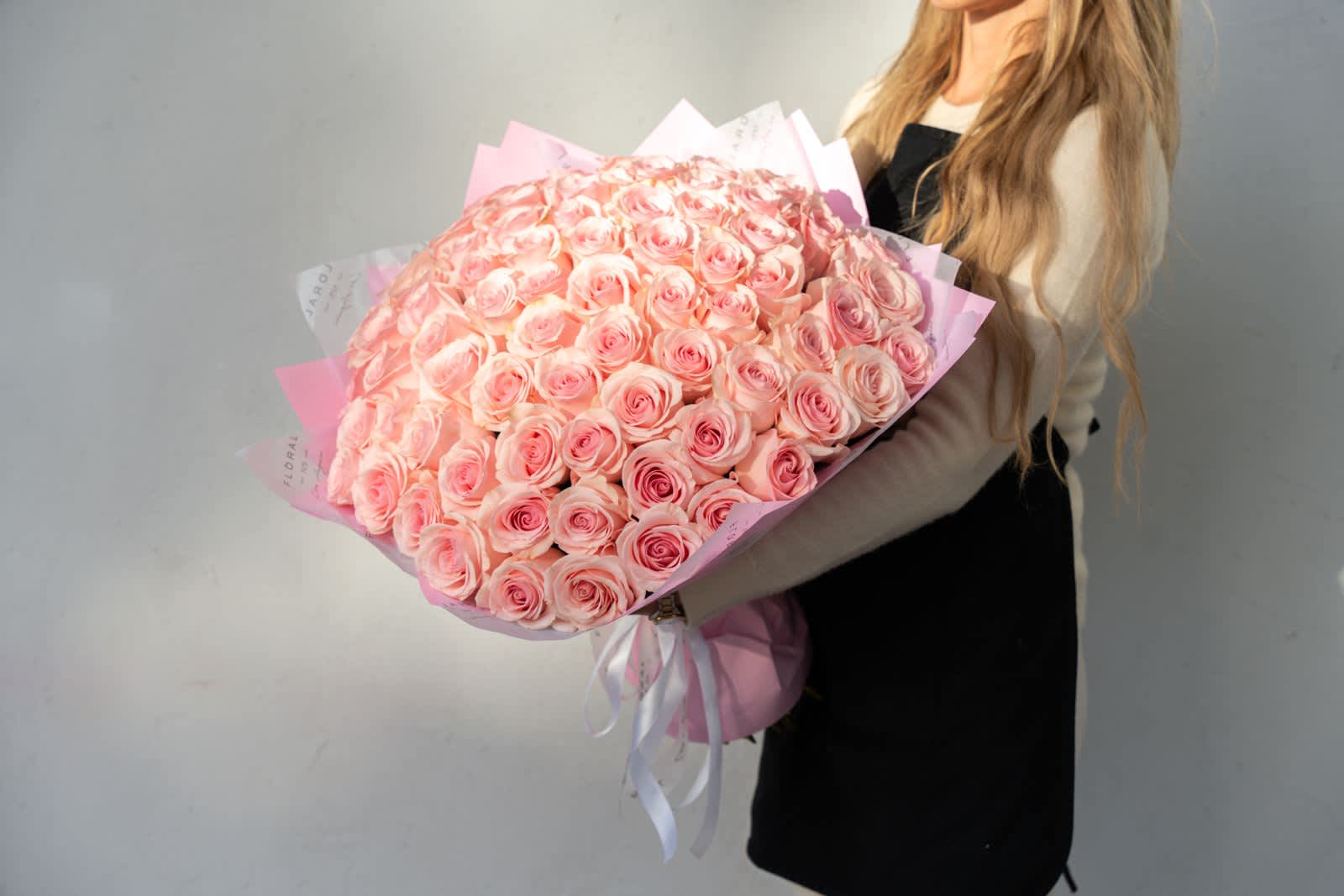 NO. 358 - 75 Pink Roses Bouquet NO. 358 - 75 Pink Roses Bouquet - Handcrafted by our expert florist in Studio City, this bouquet features classic roses arranged with timeless elegance and care. Perfect for any occasion, it brings beauty and sentiment together in every petal. Enjoy the convenience of same day flower delivery, making it easy to send love and joy right when it matters most. Discover the charm of a rose bouquet that speaks volumes. Standard size - 75 light pink roses Deluxe size - 100 light pink roses Premium size - 125 light pin roses