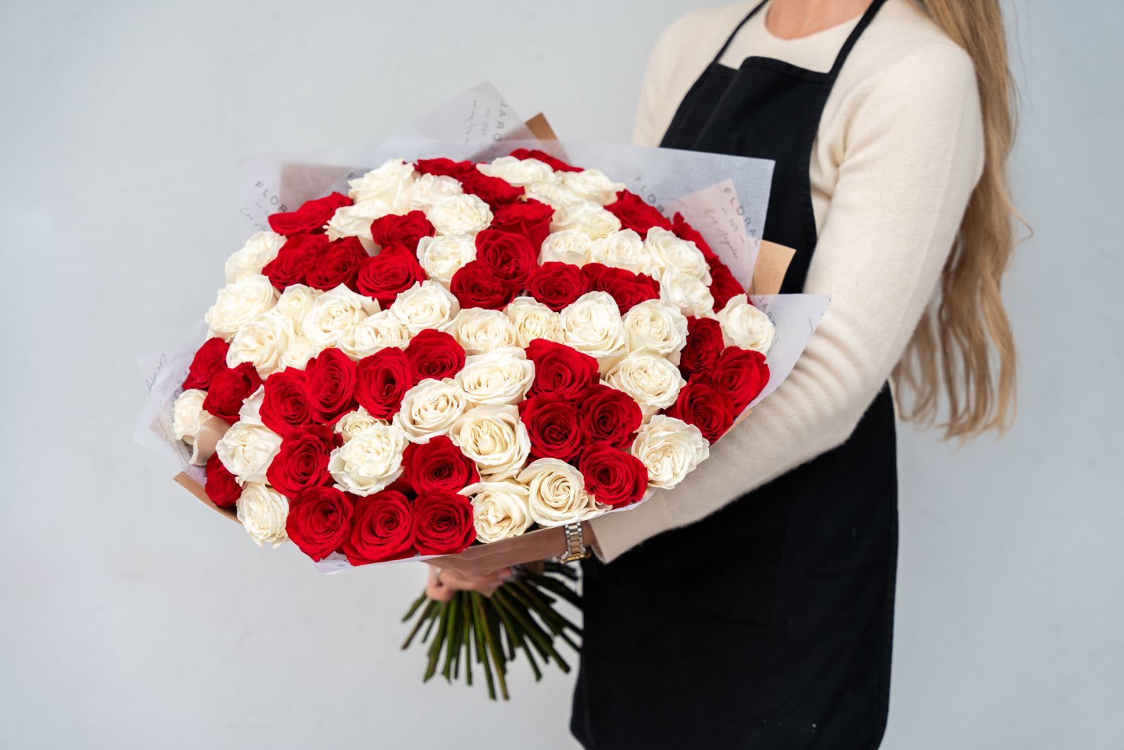NO. 359 - 75 Red and White Roses NO. 359 - 75 Red and White Roses - Handcrafted by our expert florist in Studio City, this bouquet features classic roses arranged with timeless elegance and care. Perfect for any occasion, it brings beauty and sentiment together in every petal. Enjoy the convenience of same day flower delivery, making it easy to send love and joy right when it matters most. Discover the charm of a rose bouquet that speaks volumes. 75 white and red roses Standard size - 75 roses (pictured) Deluxe size - 100 roses Premium size - 125 roses