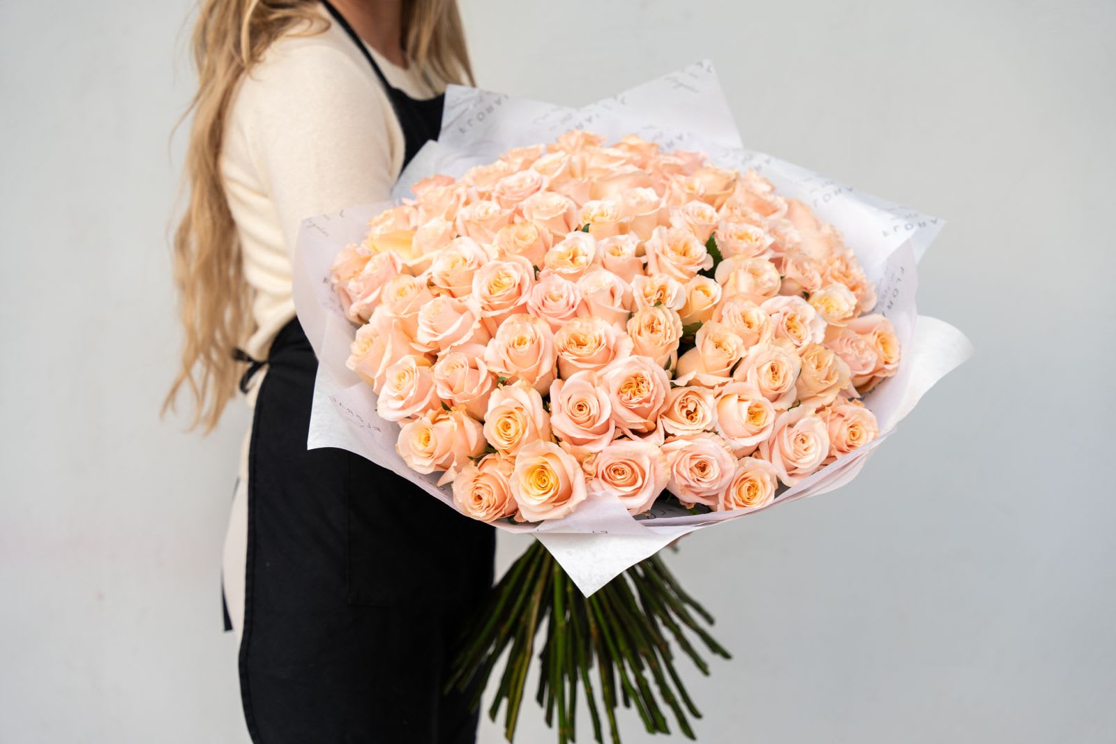 NO. 362 - 75 Peach Roses NO. 362 - 75 Peach Roses - Handcrafted by our expert florist in Studio City, this bouquet features classic roses arranged with timeless elegance and care. Perfect for any occasion, it brings beauty and sentiment together in every petal. Enjoy the convenience of same day flower delivery, making it easy to send love and joy right when it matters most. Discover the charm of a rose bouquet that speaks volumes. Standard size - 75 roses (pictured) Deluxe size - 100 roses Premium size - 125 roses