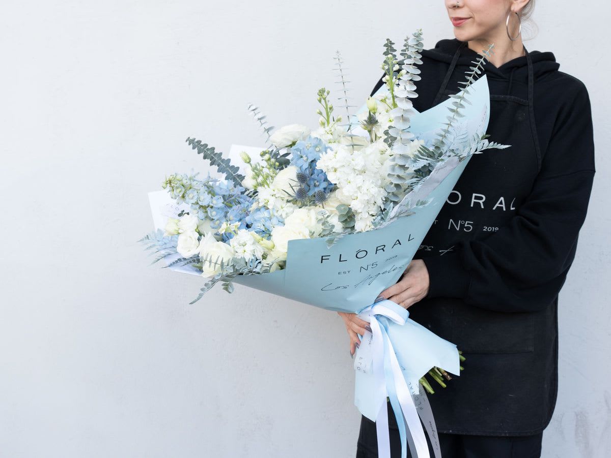NO. 927 - TENDER BLUE NO. 927 - TENDER BLUE - This mixed blue flower bouquet is a heartfelt expression of life’s most meaningful moments—crafted with care by our dedicated florist in Studio City. Each stem is thoughtfully selected to create a vibrant blend of color, fragrance, and feeling. More than just flowers, it's a gesture that speaks volumes. With same day flower delivery, your sentiment arrives right on time, beautifully delivered and impossible to forget. Size on the picture - standard.
