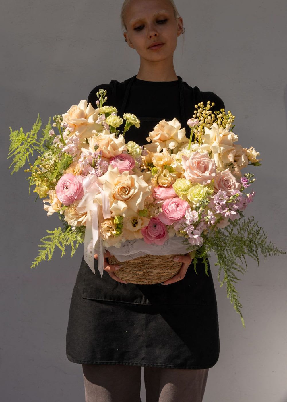 NO. 969 - PRETTY BASKET - A modern take on floral gifting, this beautiful and tender spring arrangement in a basket is a curated blend of seasonal blooms and textures, thoughtfully designed in Studio City. Each basket is a unique expression of beauty and emotion—perfect for making a lasting impression. Whether it’s a celebration or a simple gesture of love, our same day flower delivery ensures your heartfelt gift arrives fresh, elegant, and right on time.  Size on the photo - Standard.