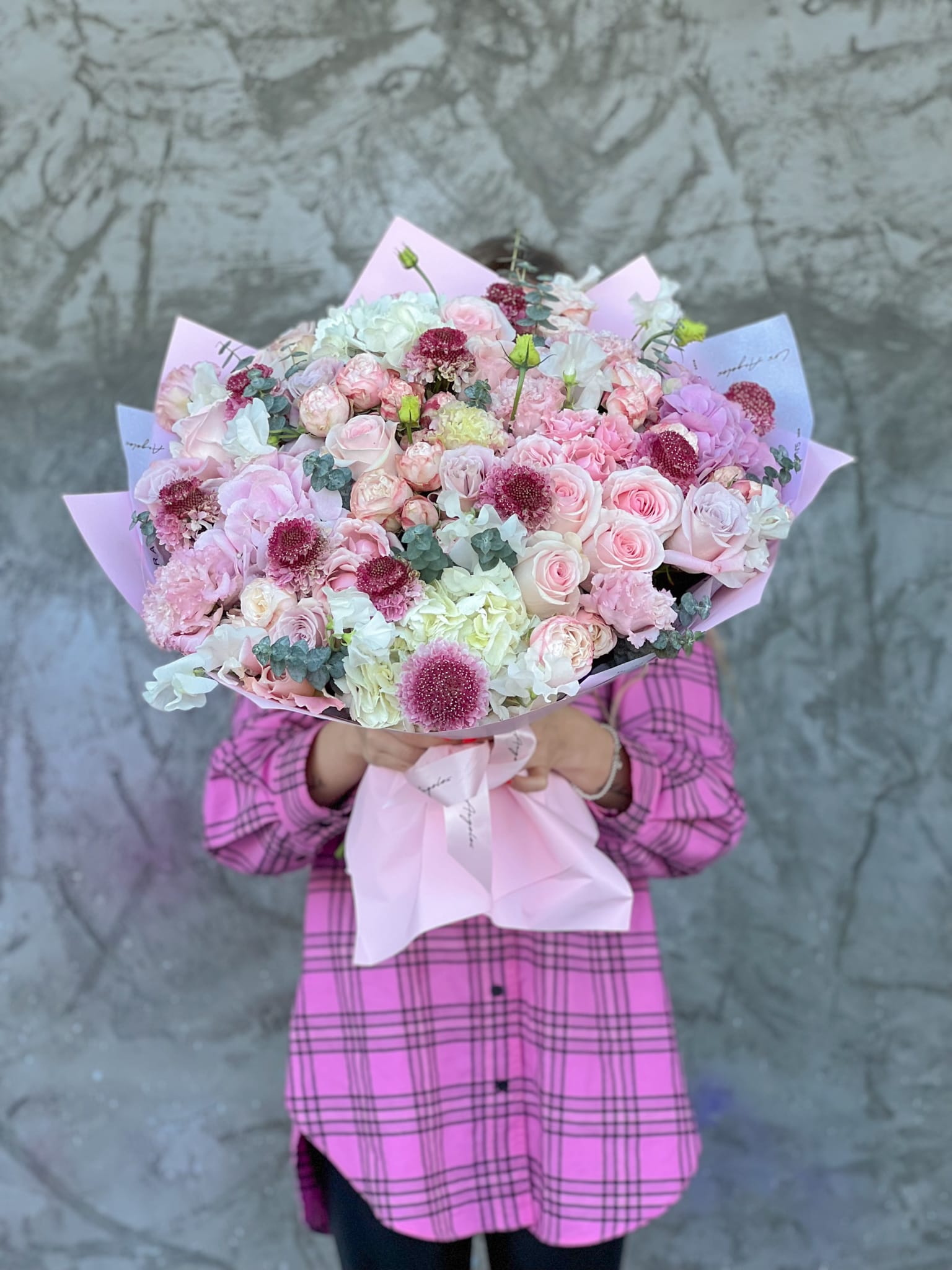 No.104 - Cuti No.104 - Cuti - This mixed flower bouquet is a heartfelt expression of life’s most meaningful moments—crafted with care by our dedicated florist in Studio City. A combination of Roses, Scabiosas, Bombastic Roses, Hydrangeas and Eucalyptus is more than just flowers, it's a gesture that speaks volumes. With same day flower delivery, your sentiment arrives right on time, beautifully delivered and impossible to forget. Available in three size options. On the photo: Size - Deluxe