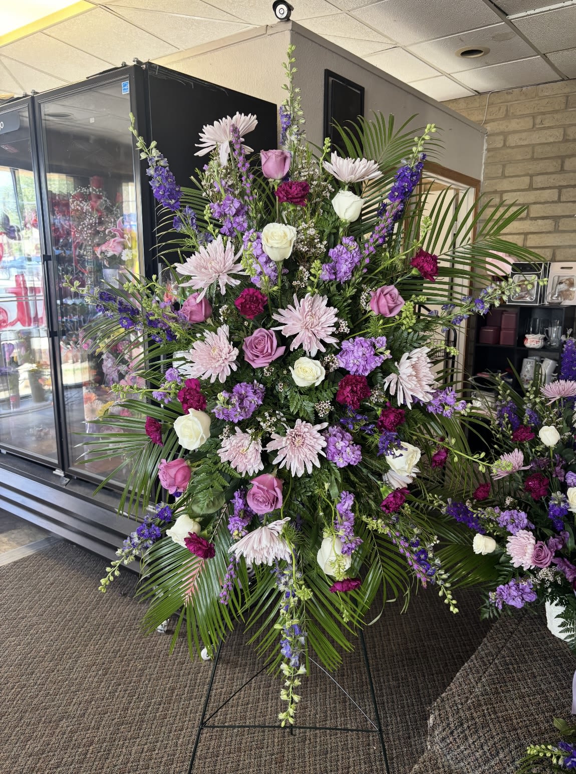 Purple Standing Spray Purple Standing Spray - floral standing spray, includes Banner message , Include banner message in notes for florist /special instructions