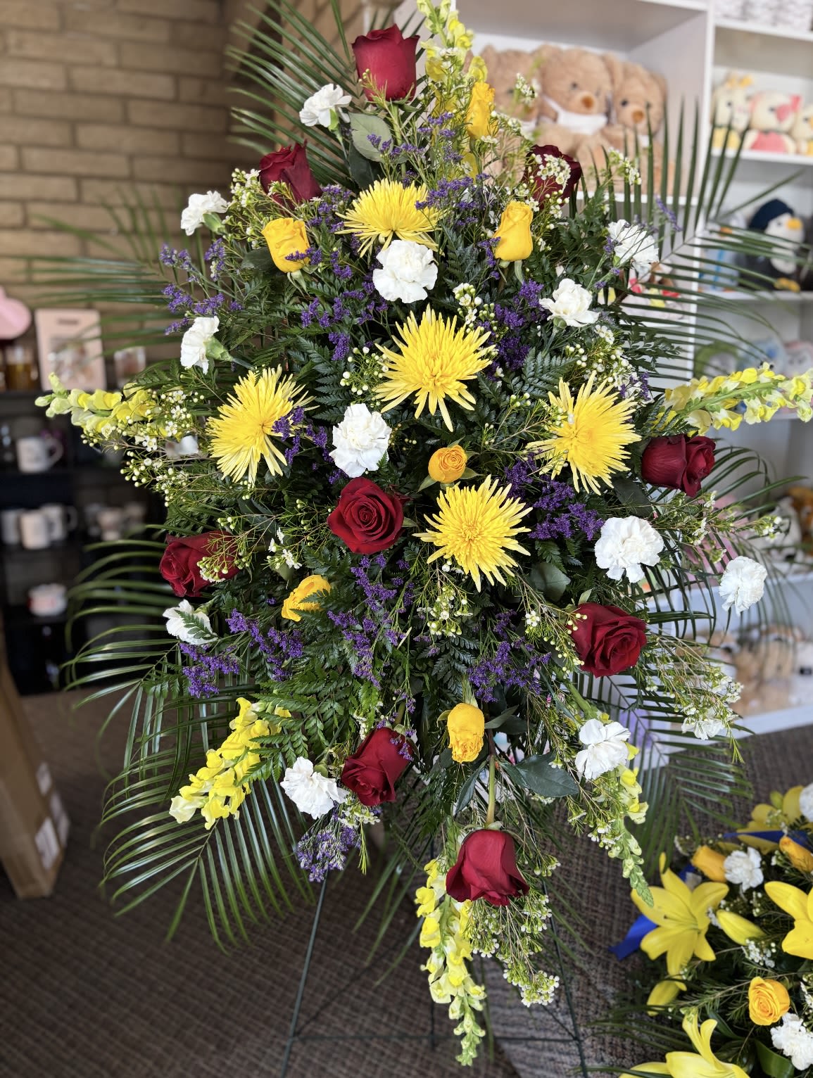 Yellow & Red Standing Spray Yellow & Red Standing Spray - floral standing spray , includes Banner message , Include banner message in notes for florist /special instructions