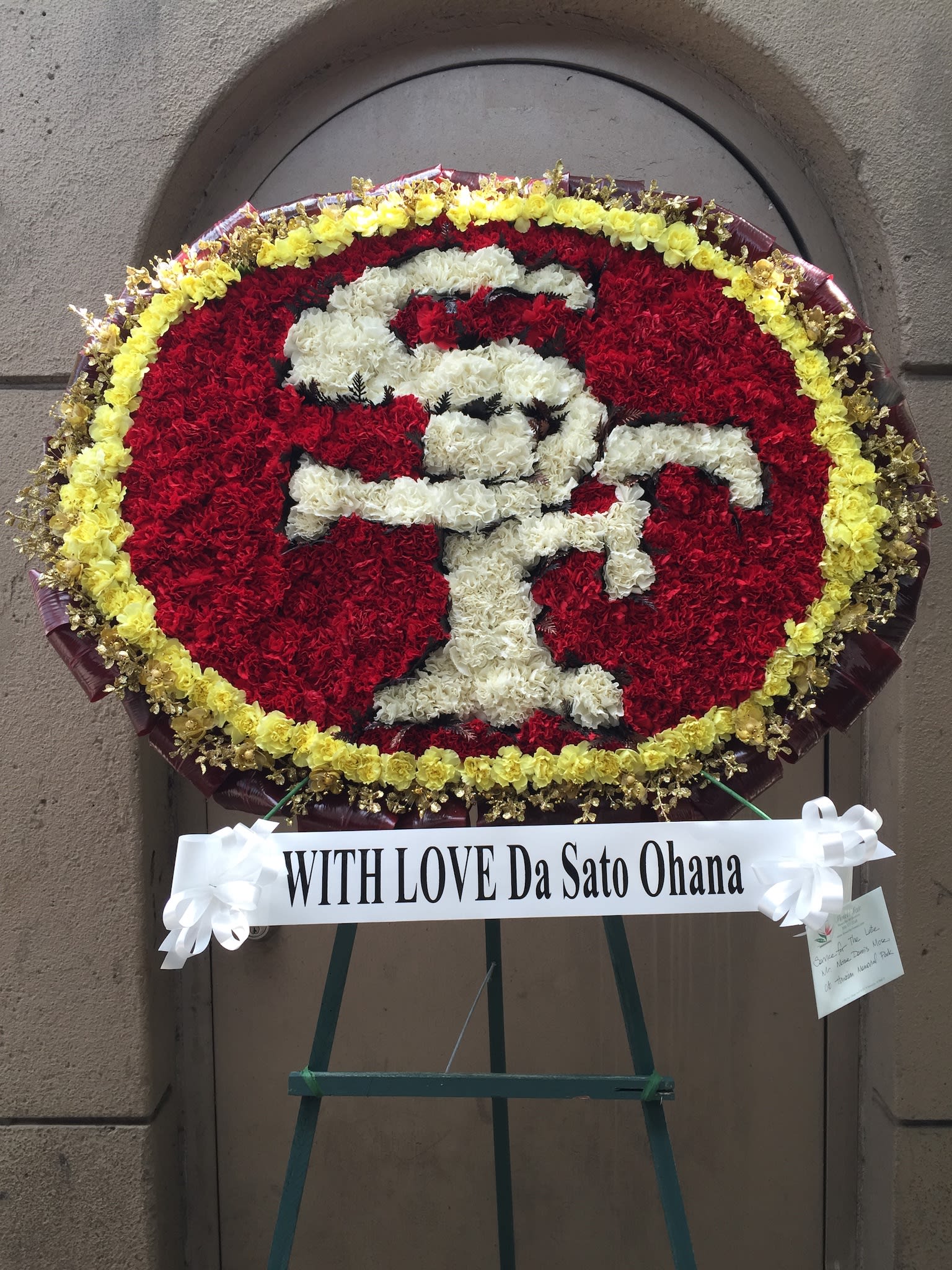 Custom Niners Wreath - W20020 - Custom Niners wreath using red, yellow and white carnations.