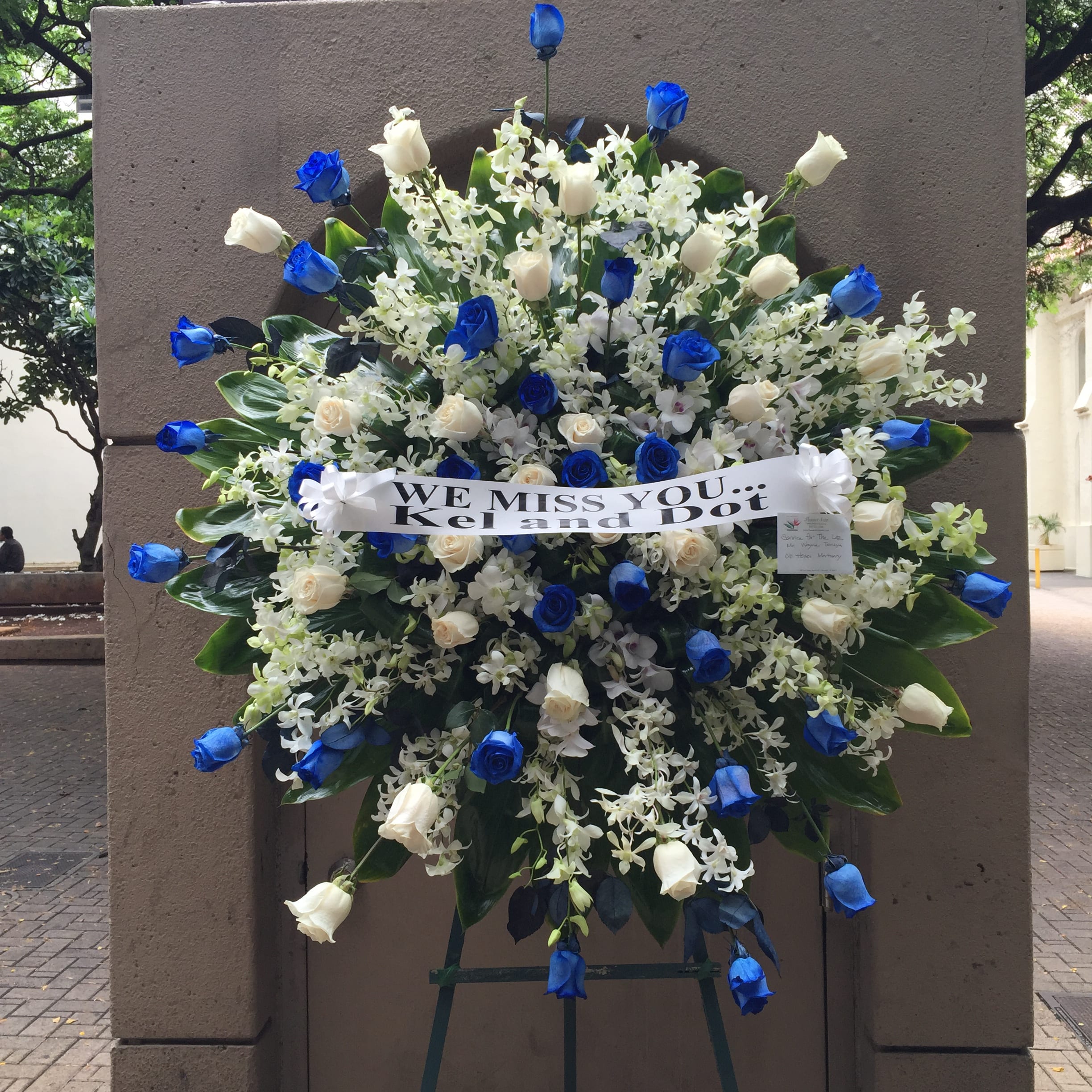 Sky Burst Wreath of Blue &amp; White Roses and Orchid Sprays - F30011 - Spectacular burst of unique Blue and White Roses and white Orchids throughout