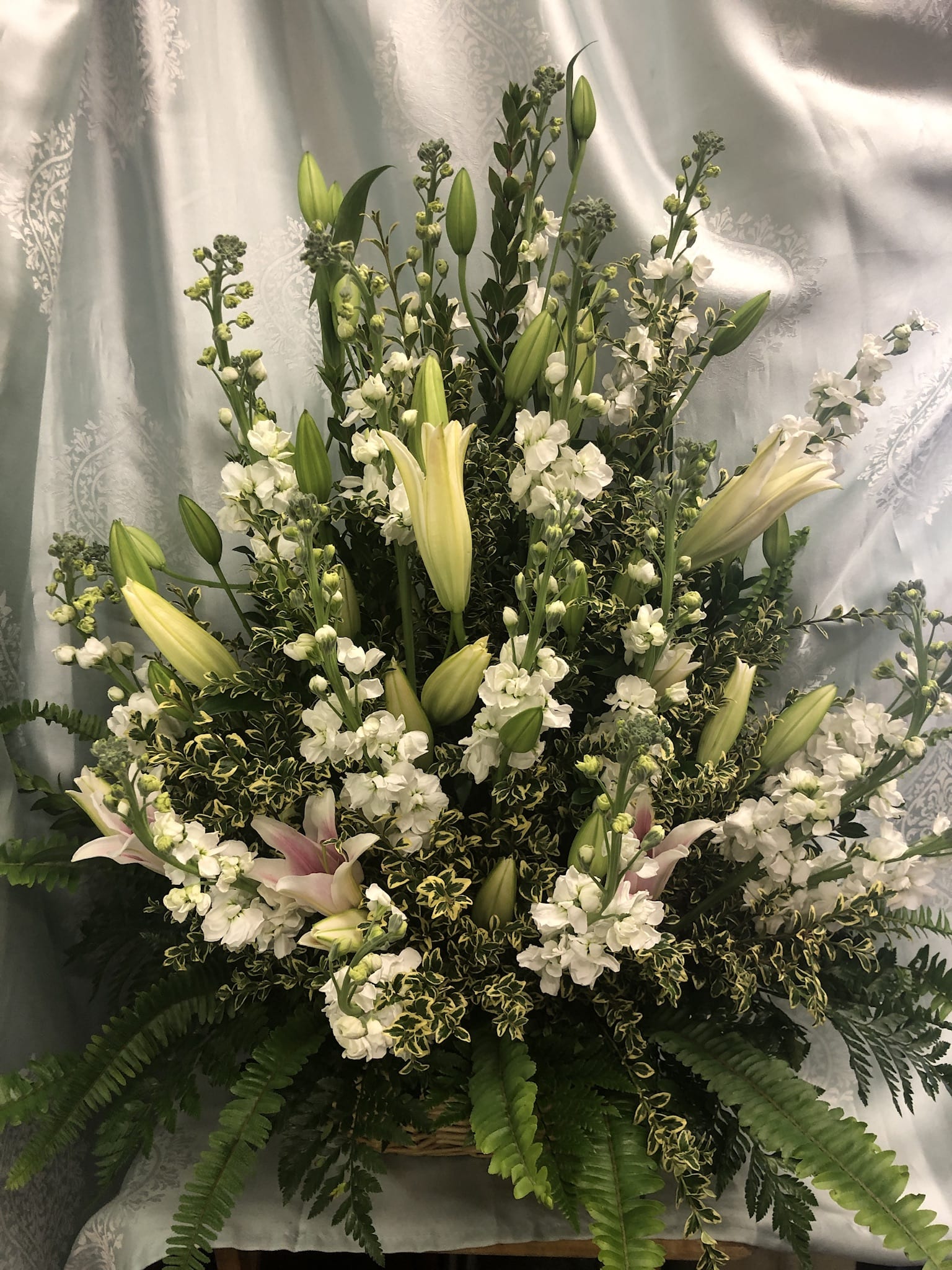 Gracefully Elegant arrangement Gracefully Elegant arrangement - Stately tiger lilies cushion against spikes of elegant white flowers, impactful and graceful.