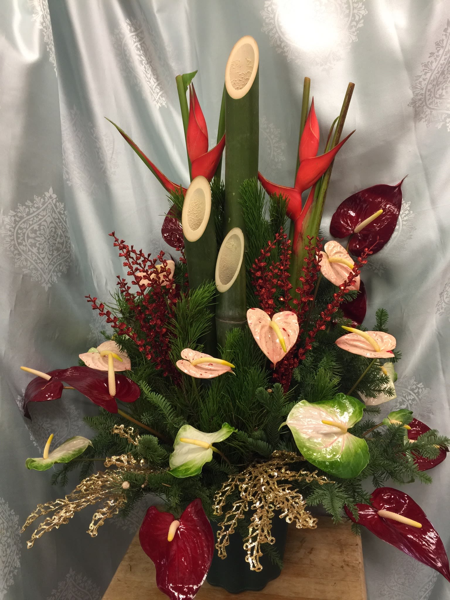 Kadomatsu Anthurium Arrangement KADO-001 - Grand tropical floral with colorful array of antherium and elegant kadomatsu bamboo intermix with festive holiday decoration