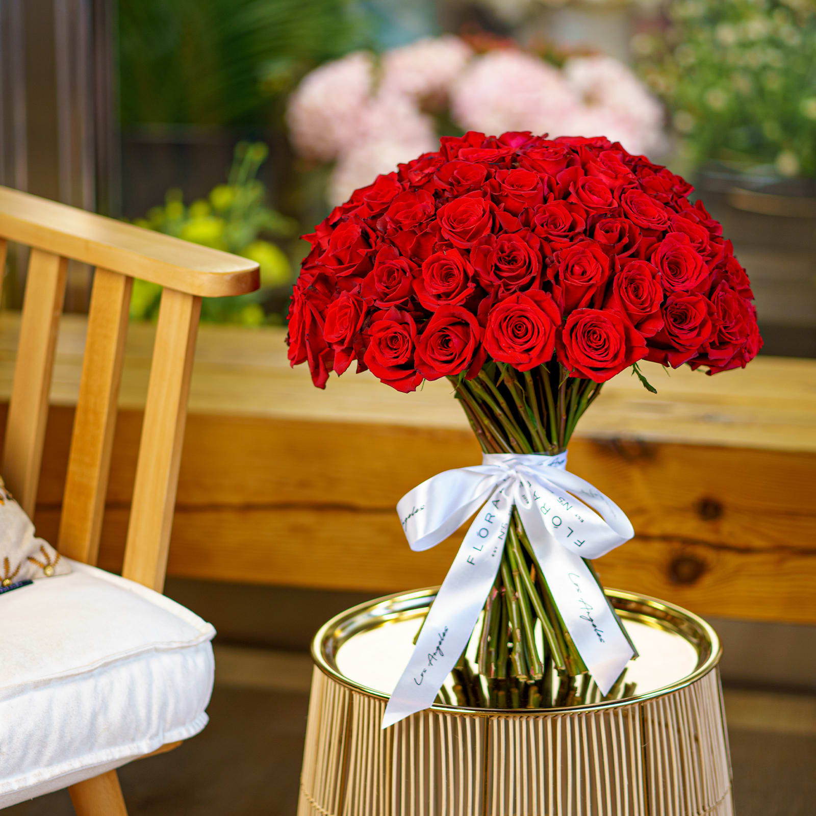 No.126 - Red Roses No.126 - Red Roses - Handcrafted by our expert florist in Studio City, this bouquet features classic roses arranged with timeless elegance and care. Perfect for any occasion, it brings beauty and sentiment together in every petal. Enjoy the convenience of same day flower delivery, making it easy to send love and joy right when it matters most. Discover the charm of a rose bouquet that speaks volumes. Standard 50 classic red roses. Deluxe 75 roses.