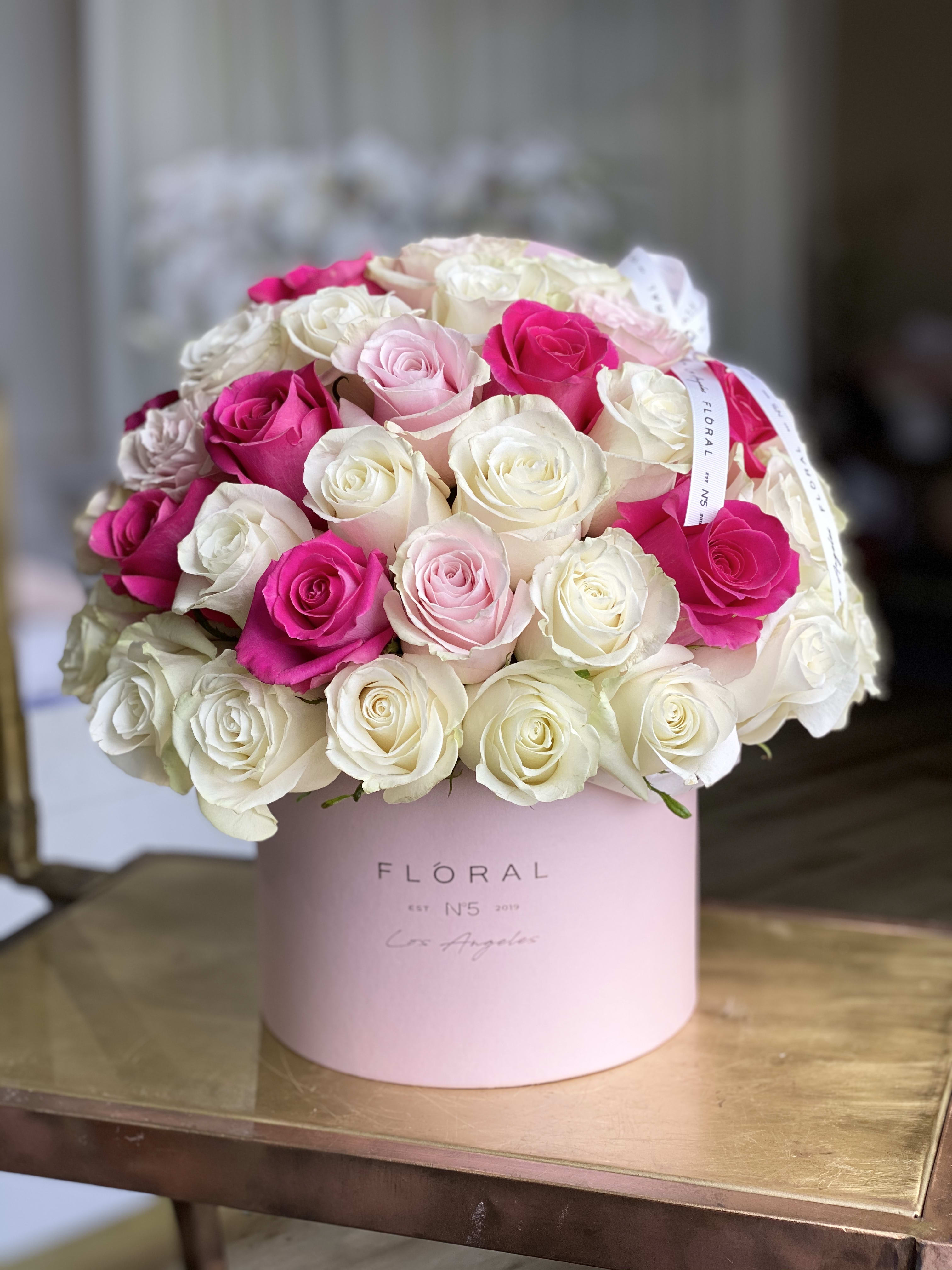 No.134-Mix of Roses No.134-Mix of Roses - Expertly arranged by our skilled florist in Studio City, this box of classic roses offers a modern twist on a timeless gesture. Elegant and refined, it's the perfect gift for any occasion. With same day flower delivery available, sending a stunning floral surprise has never been easier. Experience the beauty and sophistication of a luxurious rose presentation. Available in three size options and diverse box textures and colors. Standard size - 50 roses. Deluxe size - 75 roses. Premium size - 125 roses. On the photo: Size - Standard, Box Material - Velvet, Box Color - Pink.
