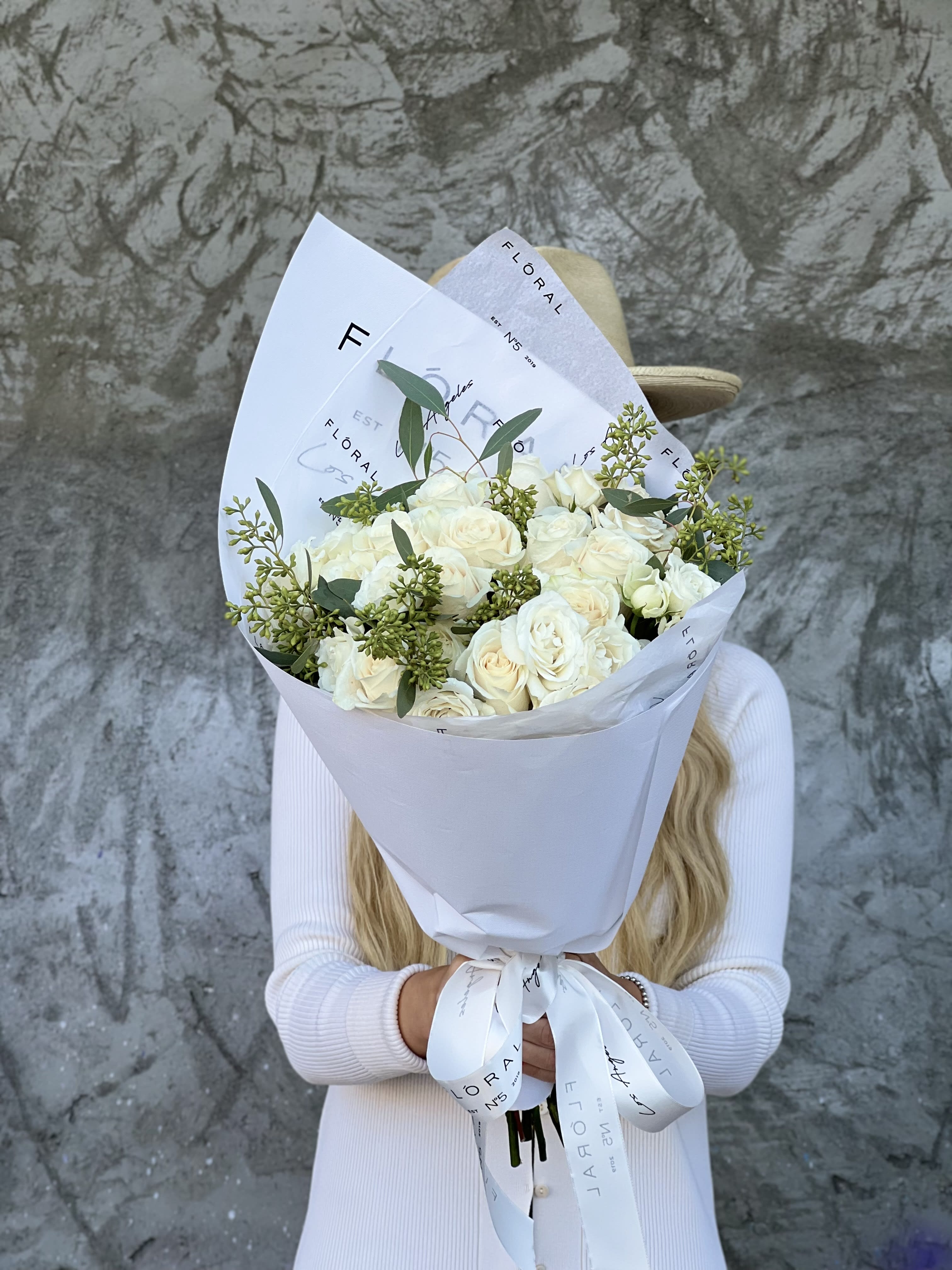 No.173 - White Dreams - This mixed roses bouquet is a heartfelt expression of life’s most meaningful moments—crafted with care by our dedicated florist in Studio City. Each stem is thoughtfully selected to create a vibrant blend of color, fragrance, and feeling. More than just flowers, it's a gesture that speaks volumes. With same day flower delivery, your sentiment arrives right on time, beautifully delivered and impossible to forget.  Available in three size options: Standard size - 18 stems regular and 6 spray red roses Deluxe size - 25 stems regular and 10 spray red roses Premium size - 33 stems regular and 14 spray red roses  On the photo: Size - Standard.