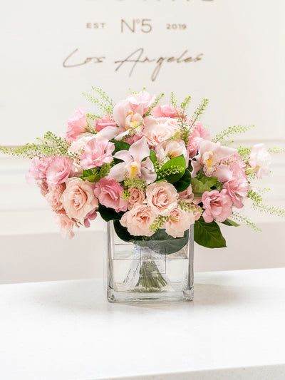 NO.31 - TIMELESS GRACE NO.31 - TIMELESS GRACE - This mixed flower bouquet made with cymbidium orchids and roses is a heartfelt expression of life’s most meaningful moments—crafted with care by our dedicated florist in Studio City. Each stem is thoughtfully selected to create a vibrant blend of color, fragrance, and feeling. More than just flowers, it's a gesture that speaks volumes. With same day flower delivery, your sentiment arrives right on time, beautifully delivered and impossible to forget. Vase 6x6. Size on the photo - Standard.