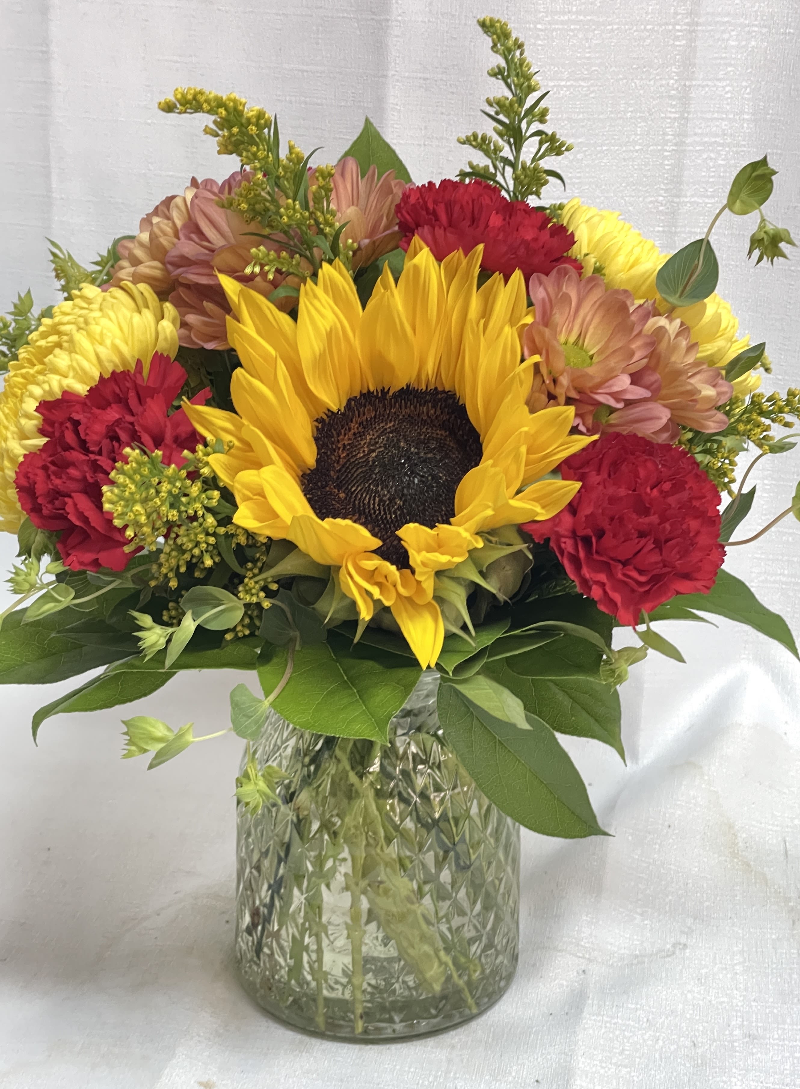 Sunshine on My Mind - Show your appreciation for all of the teachers in your lives! A stunning bouquet of sunflowers, carnations, daisies, and chrysanthemums are sure to brighten their day.