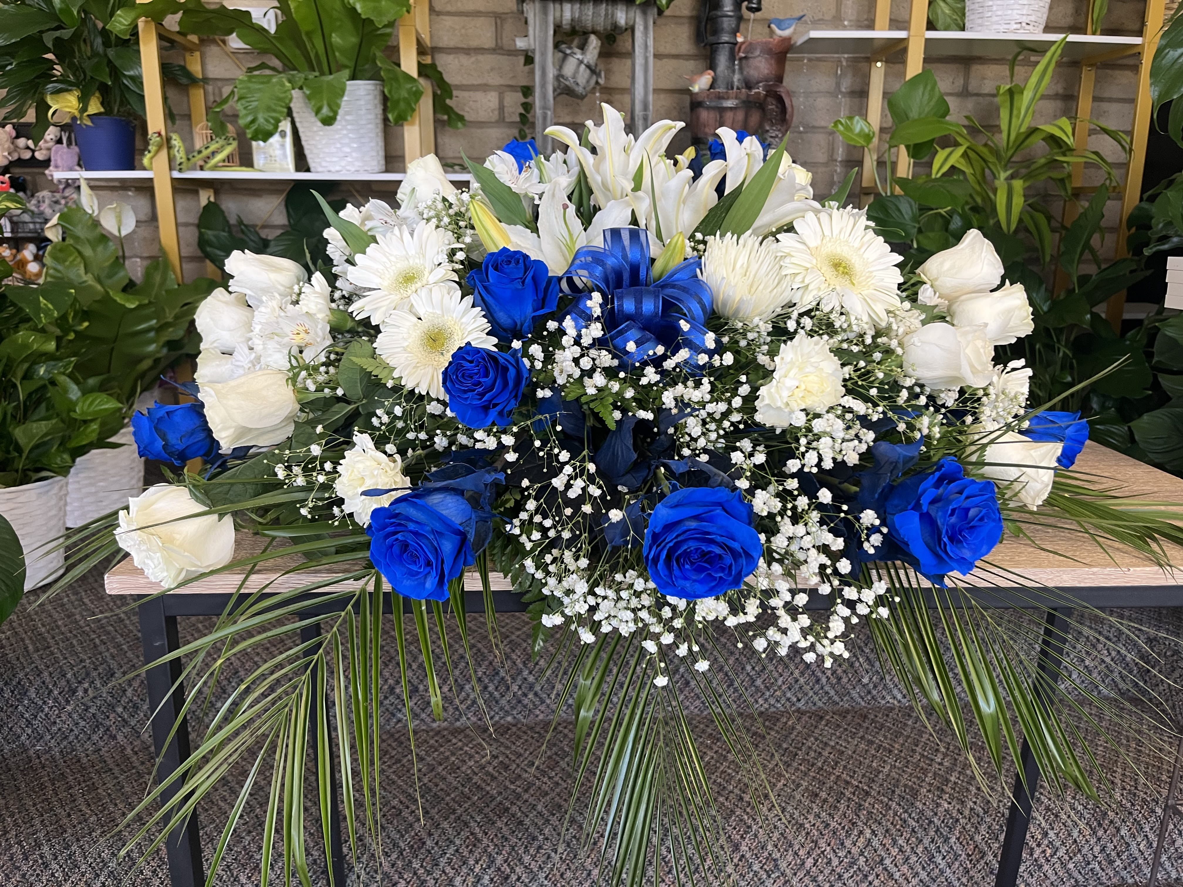 Blue &amp; White Floral Casket  - fresh white and blue flowers