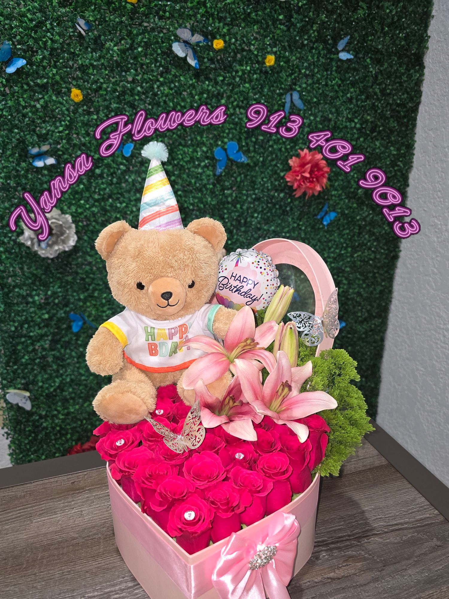 Teddy Bear Heart - Sweetness Wrapped in Love  Our Teddy Bear Heart arrangement combines the charm of a cuddly bear with the beauty of fresh florals shaped in a heart. It's the ultimate gift of love — soft, sweet, and unforgettable. Designed to melt hearts, this piece is perfect for anniversaries, birthdays, or just to say “I love you” in the most adorable way.   Delivery available  Cuteness, romance, and flowers all in one.