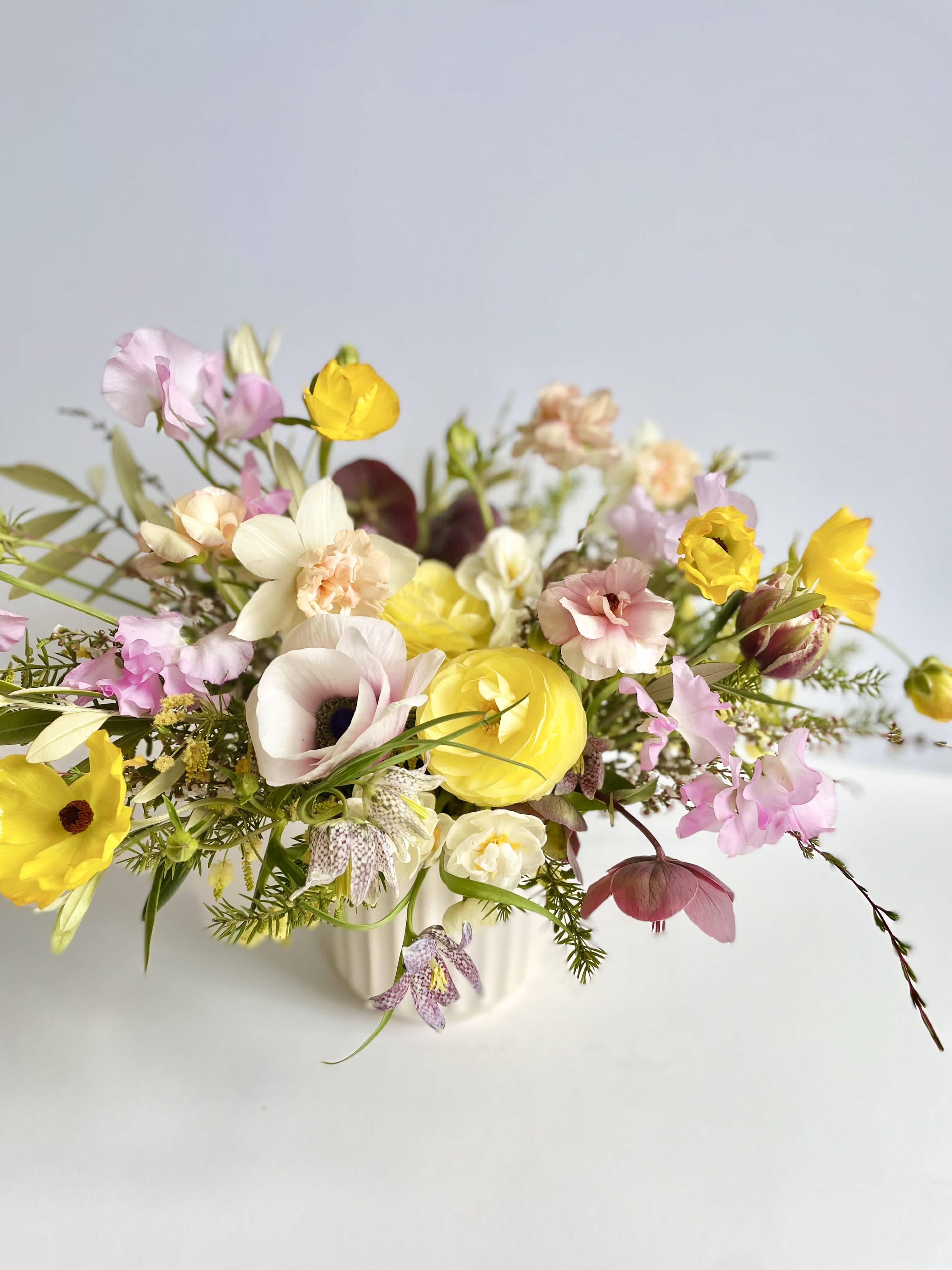 &quot;Local Beauty&quot; Arrangement *DELUXE SIZE PICTURED* - *Pictured is the DELUXE size*  An all locally sourced selection and palette; garden style in white ceramic. These flowers come from your neighbors in Santa Rosa, Petaluma, Forestville, Sebastopol, etc. This is the beauty you see growing around you all season long! Note: For this listing, color is highly variable. We focus solely on freshness and creating an arrangement with unique and long lasting locally grown blooms.   Concerning Seasonality: As a seasonal, locally-focused florist, we have different product to work with each week. Our focus is on creating a unique piece for each customer, with blooms that are fresh from local farms and growers. While the flower varieties and colors may vary, the quality and freshness will always be the best. It is an honor to have our customers' trust and confidence in our abilities and artistic eye.   Delivery Policy (**PLEASE READ**): Pick-ups at the studio are available after 2pm. Our daily delivery time frame is typically between 12 - 3 PM. Please specify if you require a certain delivery time and we will do our best to accommodate it, or we will call you if we cannot.  We gently ask that those ordering flowers please be sure to include whether or not there is a gate we may need a code for. 