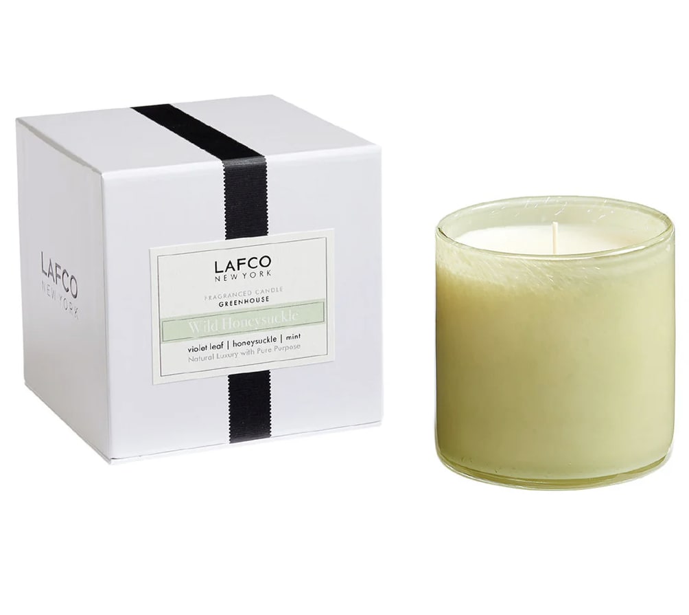 Lafco Wild Honeysuckle Candle Lafco Wild Honeysuckle Candle - Lafco Single Wick Candle | Wild Honeysuckle 15.5oz Refreshing minty notes blended with watery cucumber gently fade into wild honeysuckle, wisteria, and violet leaf. The floralcy mingles in the air with soft woods and warm amber.