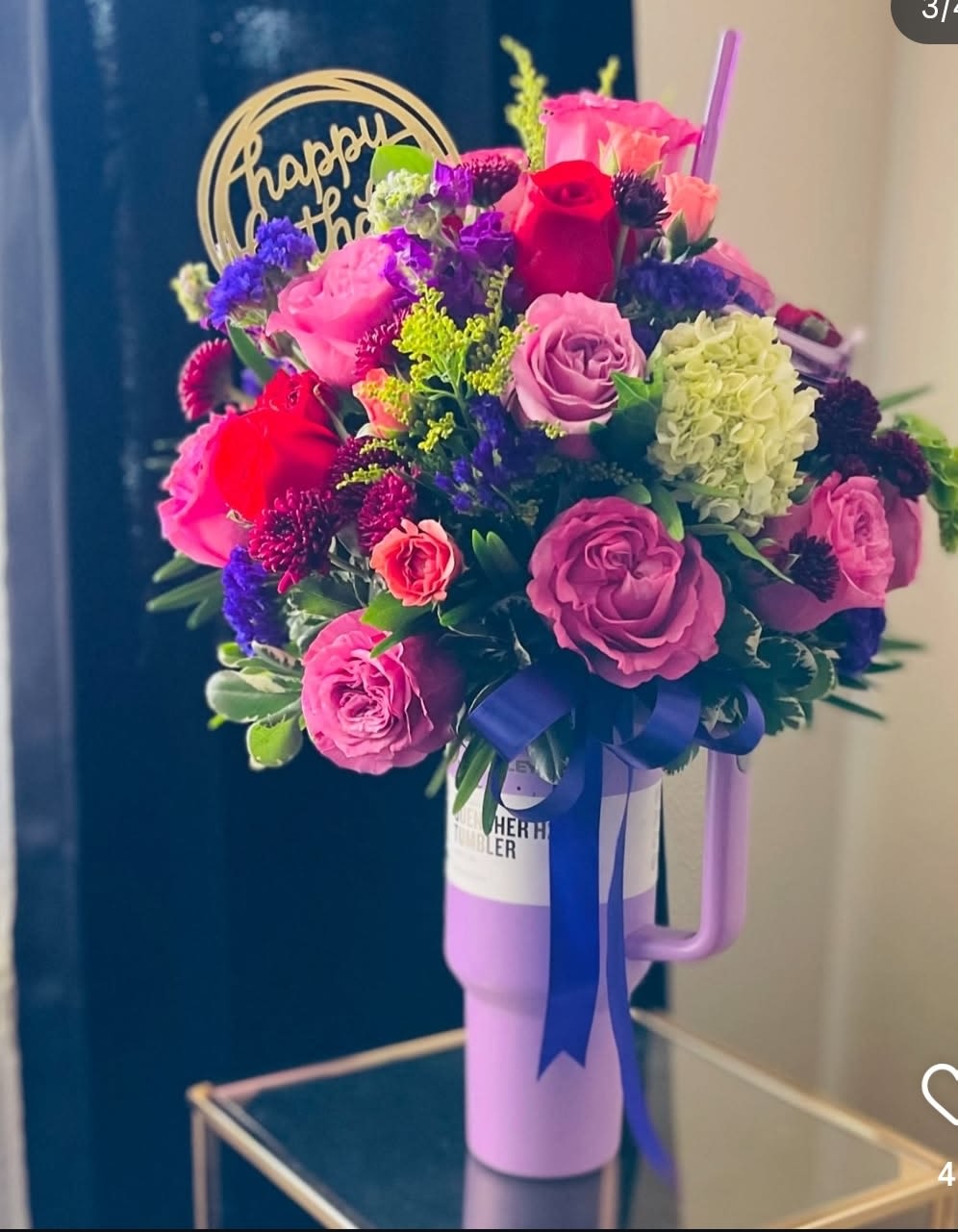 Where Elegance Meets Mystery - This isn’t just a bouquet — it’s a beautiful message delivered in blooms. Our Stanley-style mug is filled with delicate flowers in soft and deep purple tones, symbolizing grace, admiration, and a touch of mystery.  Each element is chosen with care to create a lasting impression. The reusable Stanley-style mug adds a practical and meaningful detail, turning this floral gift into a keepsake your loved one can enjoy again and again.  Perfect for birthdays, thank-you gifts, or spontaneous surprises that speak from the heart.   Delivery available — Give beauty with intention, only from Yansa Flowers  