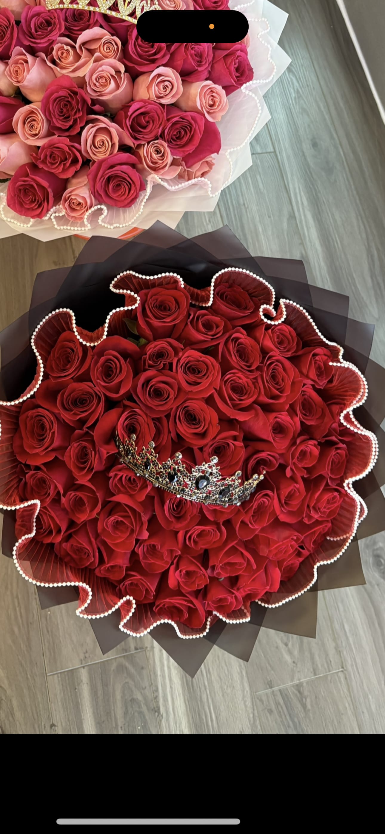 50 Rose Bouquet - 50 red roses (wrapped in paper)