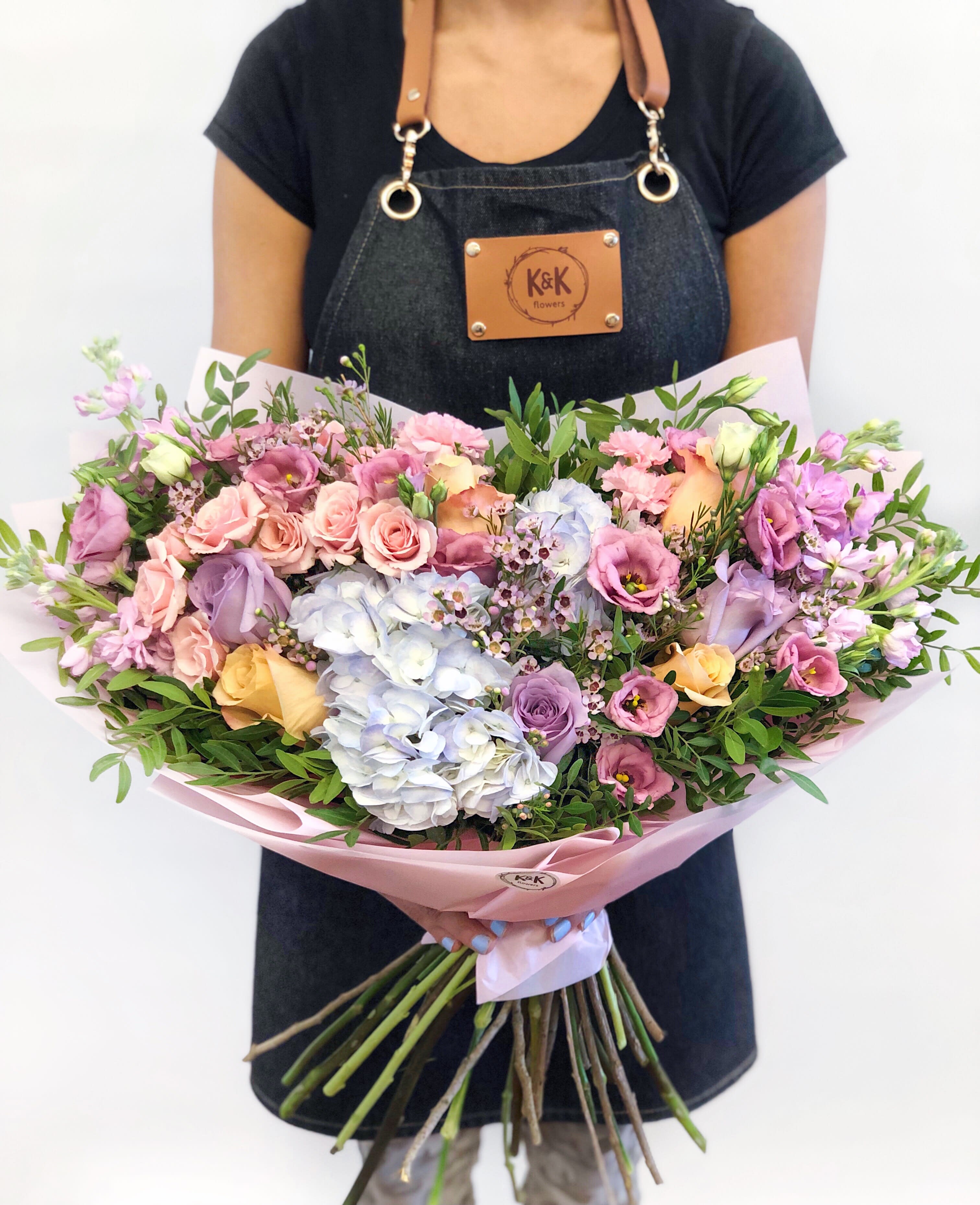 Large Loose Style Bouquet peach and lavander Large Loose Style Bouquet peach and lavander - Bouquet will be delivered approximately as pictured. 25 stems of mixed flowers