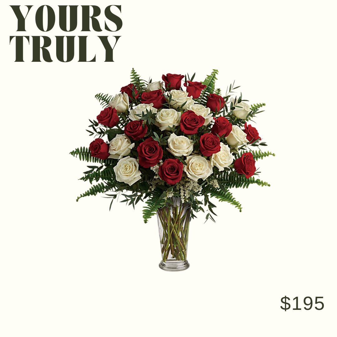 Yours Truly Bouquet 9 red and 9 white roses - Make your special someone feel truly loved by surprising them with this extraordinary bouquet! A dozen and a half red and white roses are artfully arranged in a classic vase with delicate greens. This bouquet includes red roses, white roses, white sinuata statice, parvifolia eucalyptus, and sword fern. Delivered in a clear romanesque vase.   