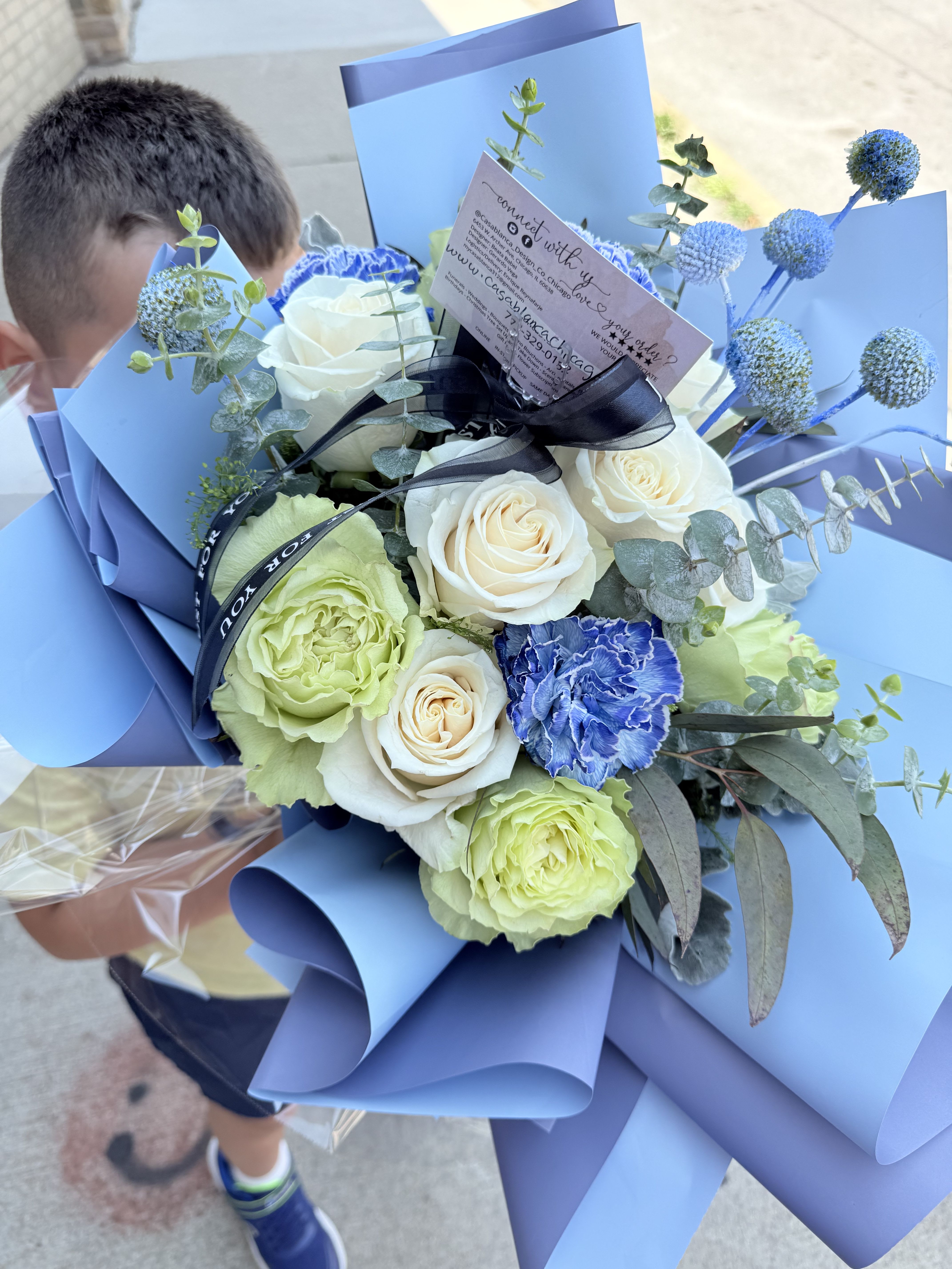 Boy You’re Mine Boy You’re Mine - Light blue, white, lime and eucalyptus wrapped with a two tone wrap and black “Just for you” ribbon.