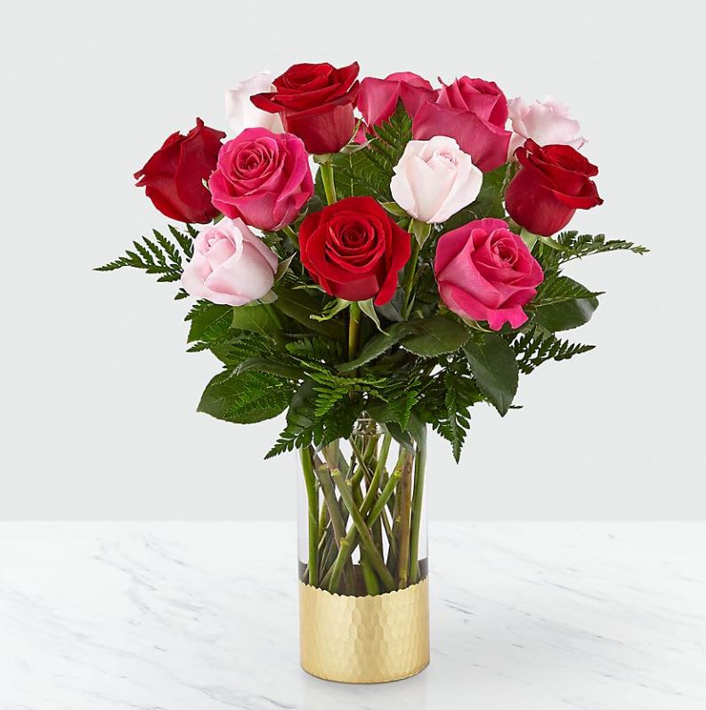 Love &amp; Roses ™ Bouquet - It's all in the name. This sweet arrangement is a soft and feminine combination of roses in three stunning shades. Each pink, hot pink and red bloom in our Love &amp; Roses™ Bouquet is perfect for sending affection to a significant other or surprising a loved one with a gorgeous Valentine.  