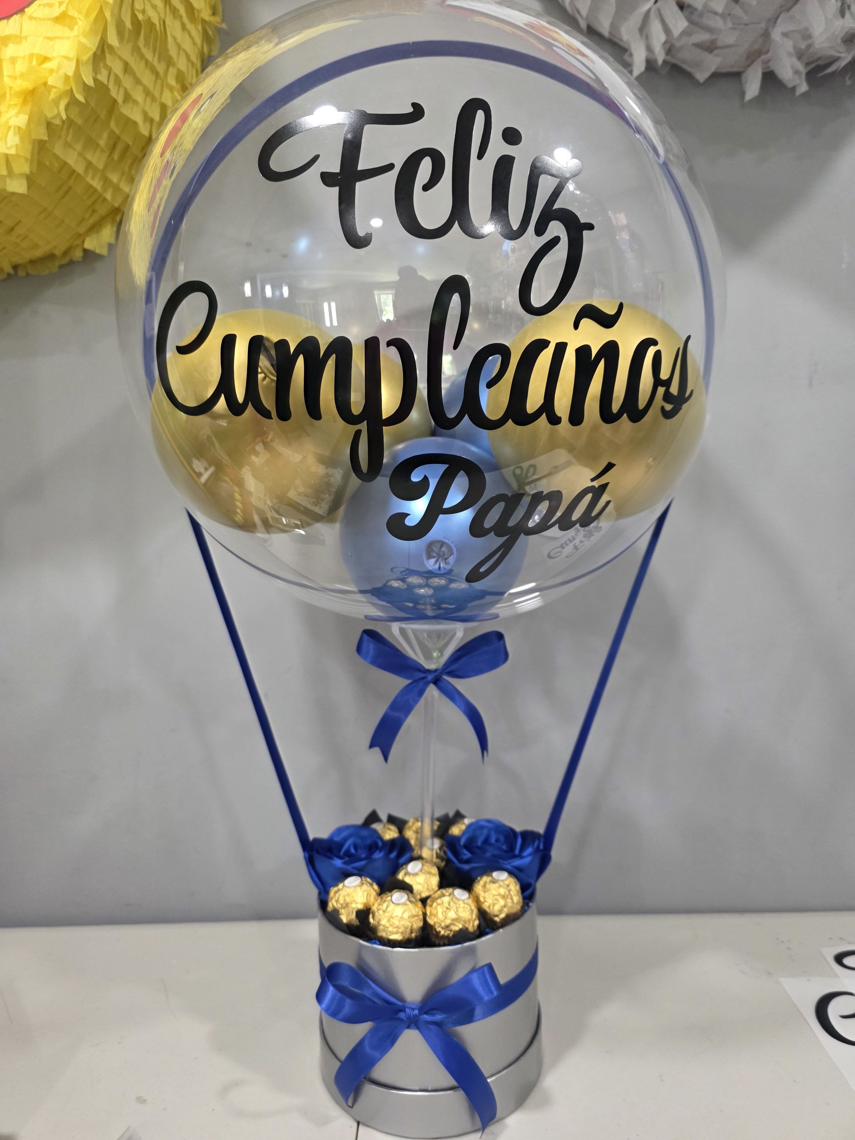 Birthday Gifts  - Birthday gifts small round box with two ribbon roses and chocolates with a balloon personalized. 